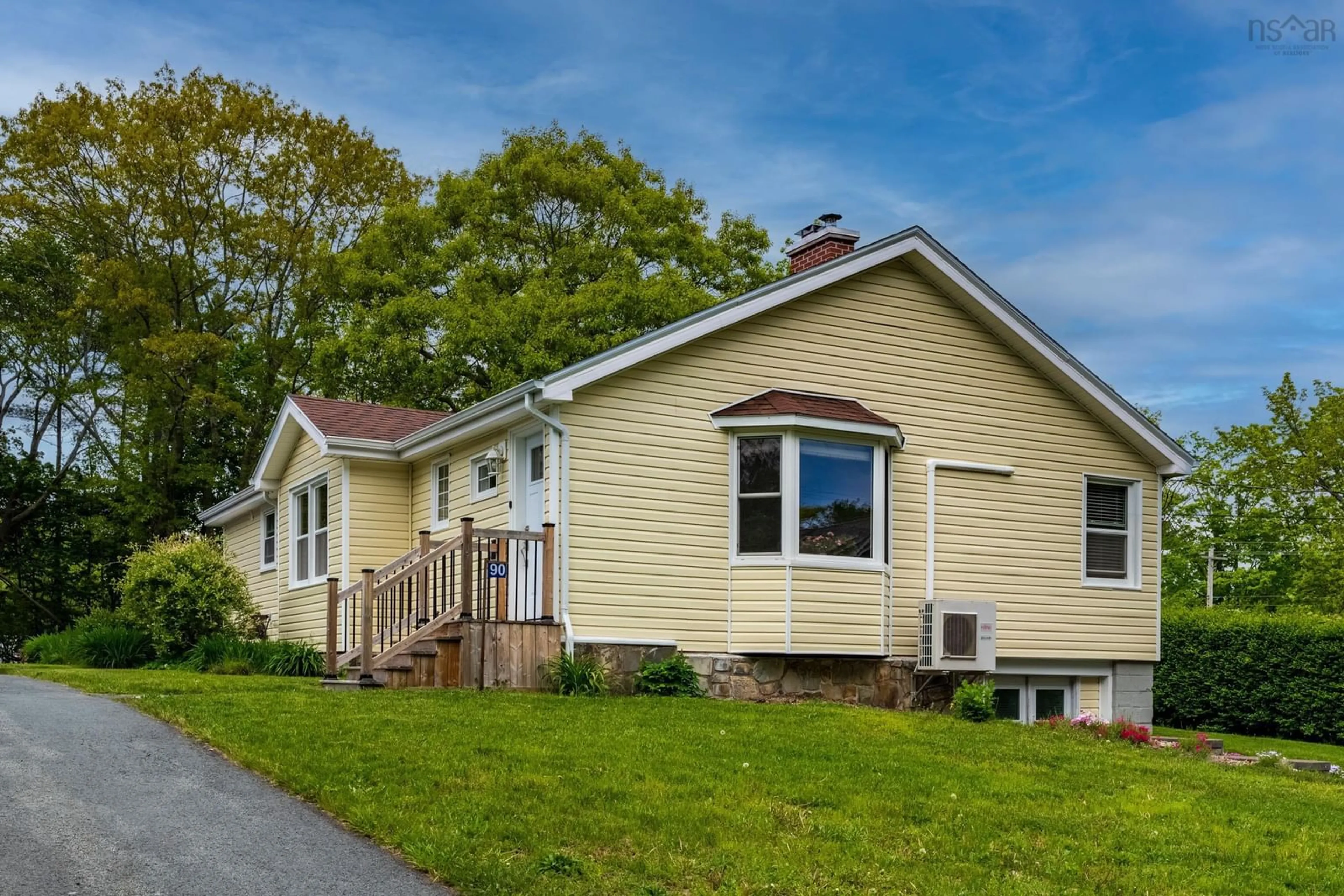 Home with vinyl exterior material, street for 90 Crescent St, Bridgewater Nova Scotia B4V 2C7