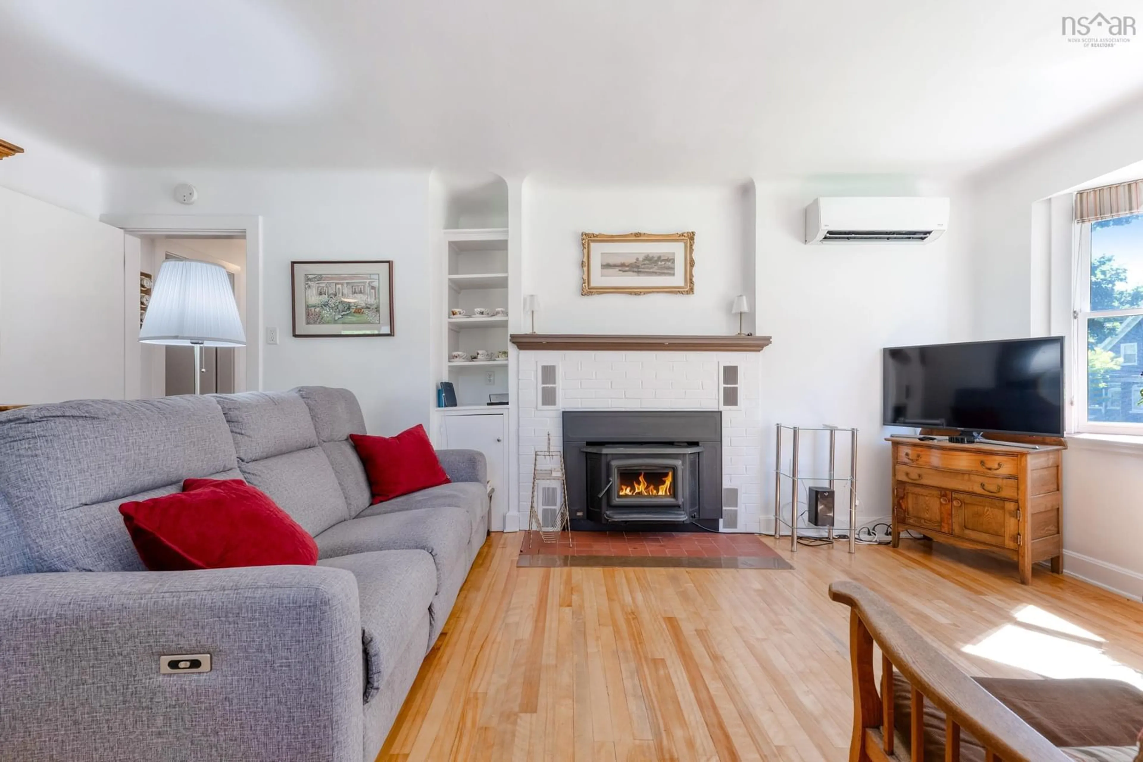 Living room with furniture, wood/laminate floor for 90 Crescent St, Bridgewater Nova Scotia B4V 2C7