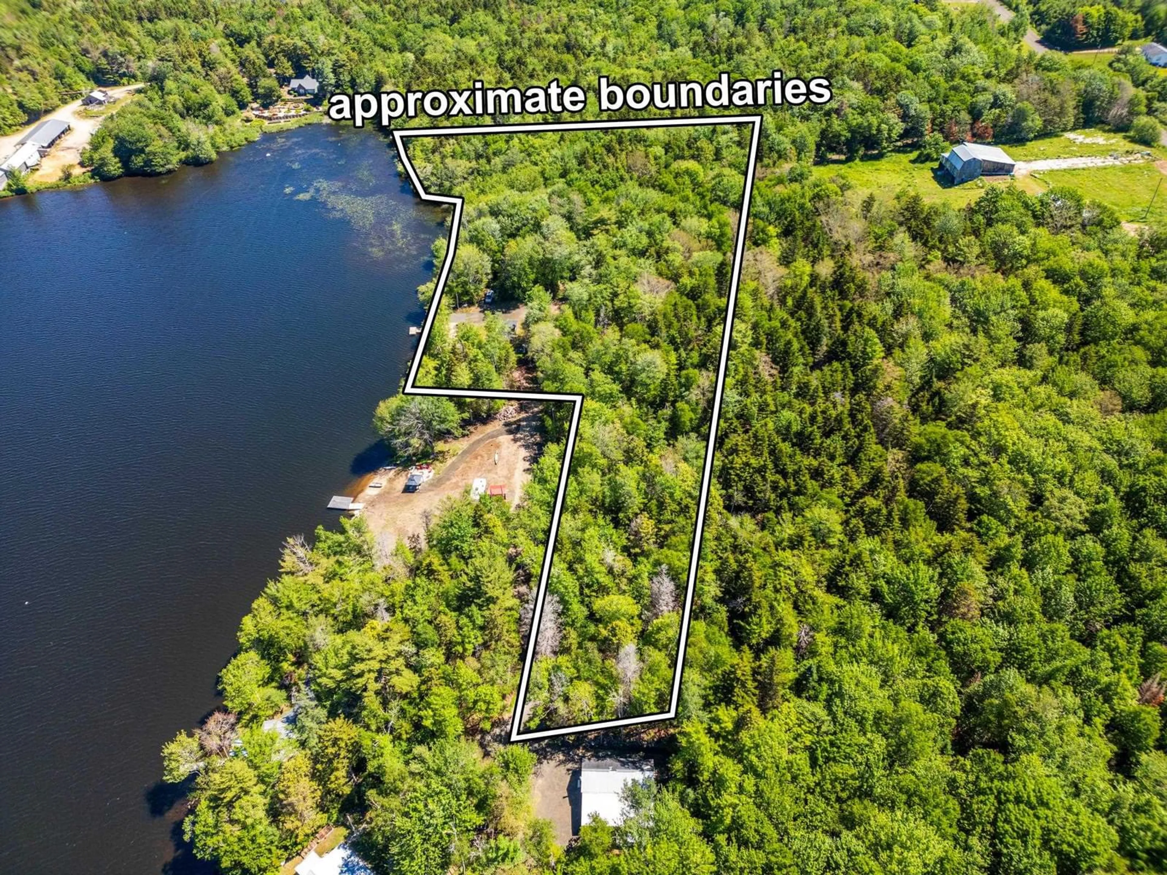 A pic from outside/outdoor area/front of a property/back of a property/a pic from drone, water/lake/river/ocean view for 54 Mallette Lake Road, South Range Nova Scotia B0W 1H0