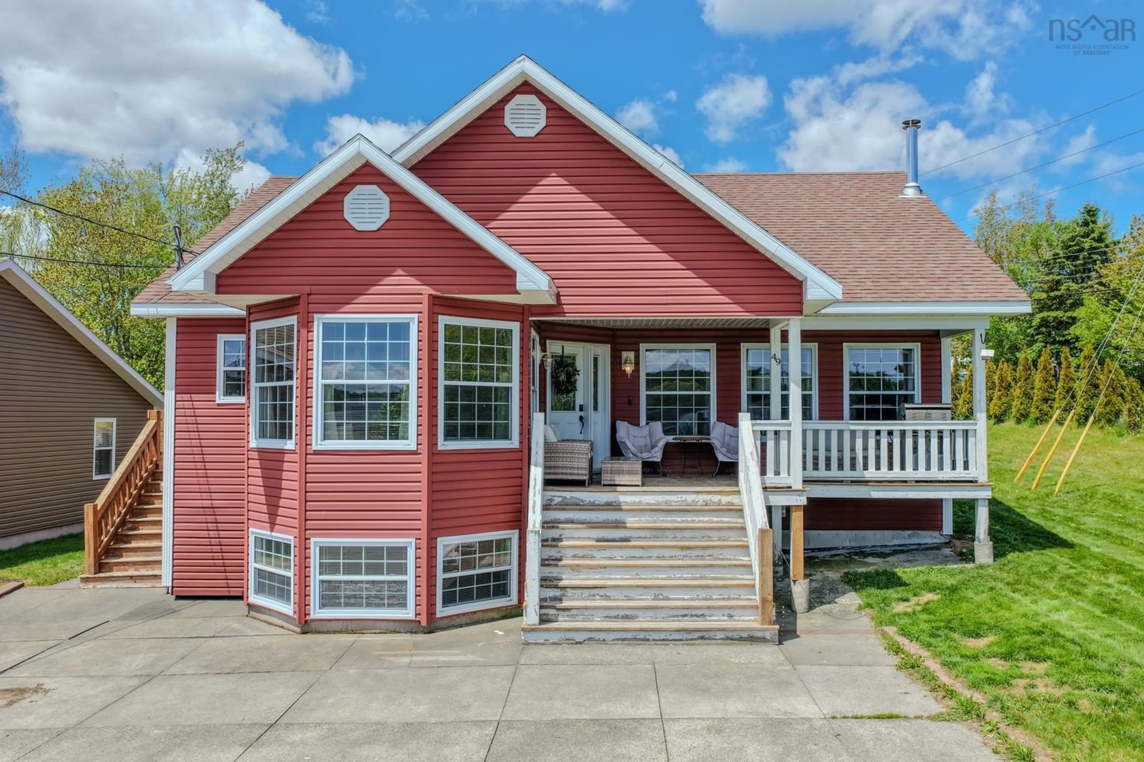 Home with vinyl exterior material, street for 49 Bernard Lind Dr, Sydney Nova Scotia B1R 7H3