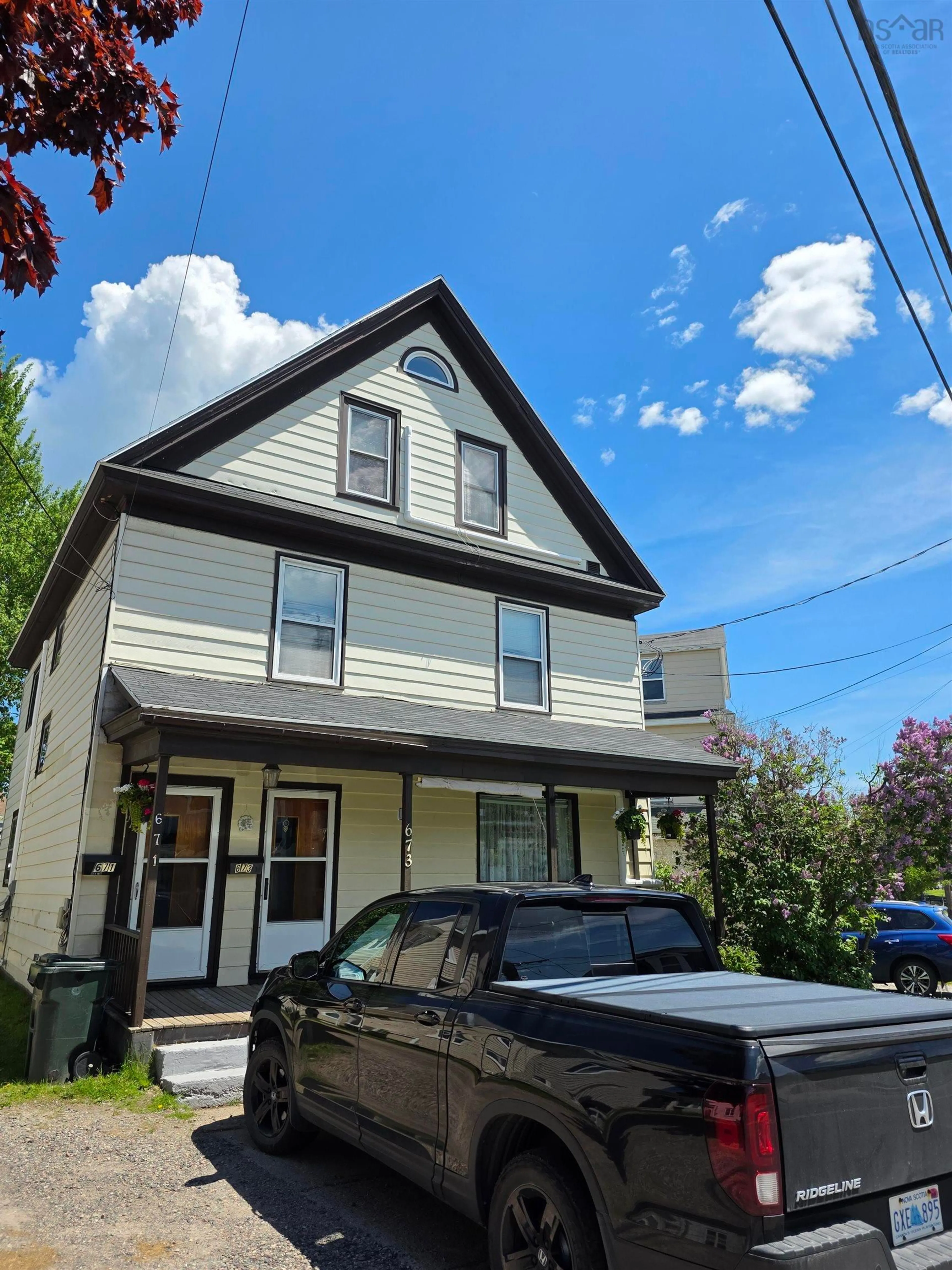 Home with vinyl exterior material, street for 673 George St St, Sydney Nova Scotia B1P 1L2