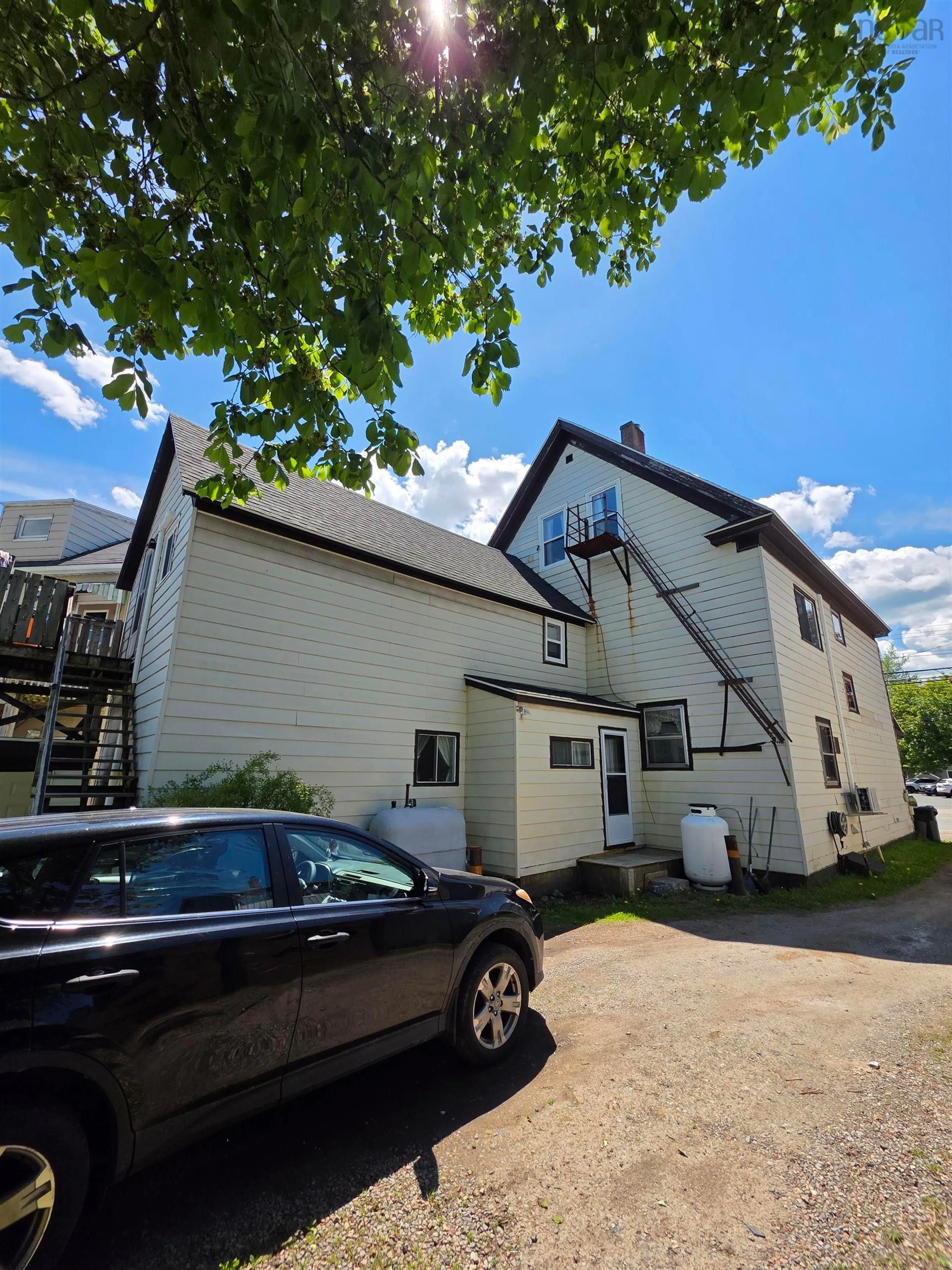 A pic from outside/outdoor area/front of a property/back of a property/a pic from drone, street for 673 George St St, Sydney Nova Scotia B1P 1L2