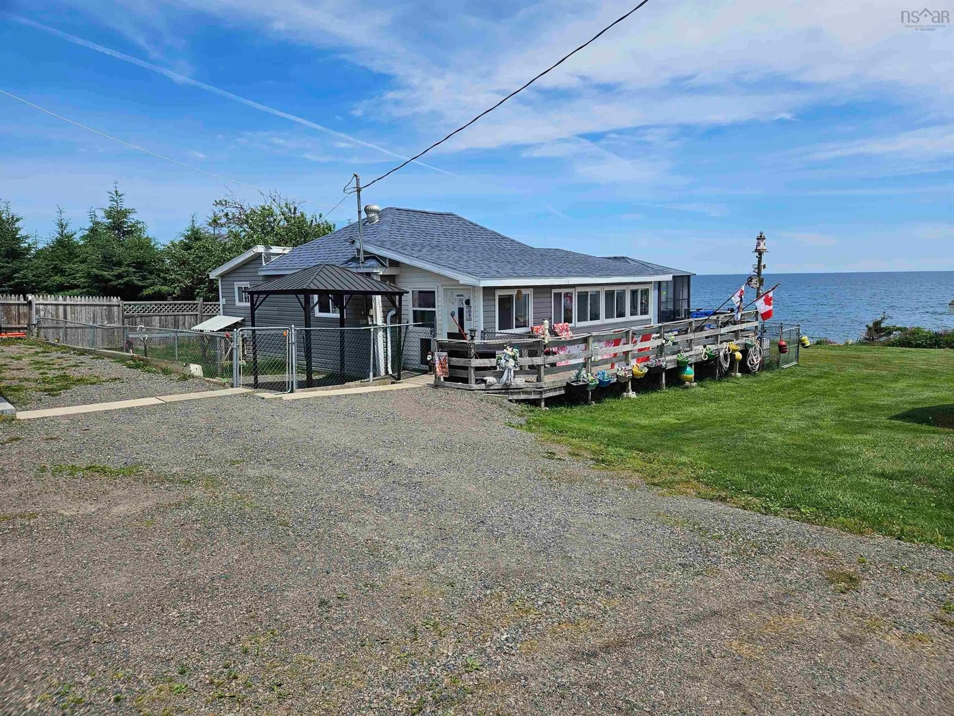A pic from outside/outdoor area/front of a property/back of a property/a pic from drone, water/lake/river/ocean view for 402 Smith Point Rd, Fox Harbour Nova Scotia B0K 1Y0