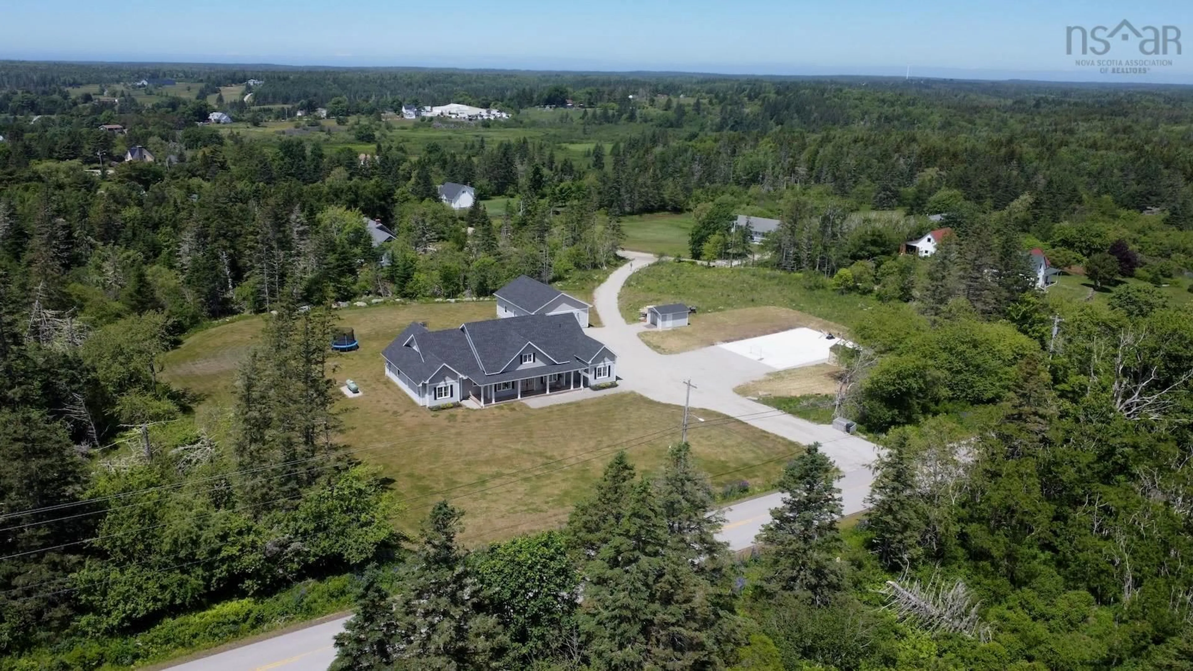 A pic from outside/outdoor area/front of a property/back of a property/a pic from drone, unknown for 217 Lake George Rd, South Ohio Nova Scotia B5A 5M9