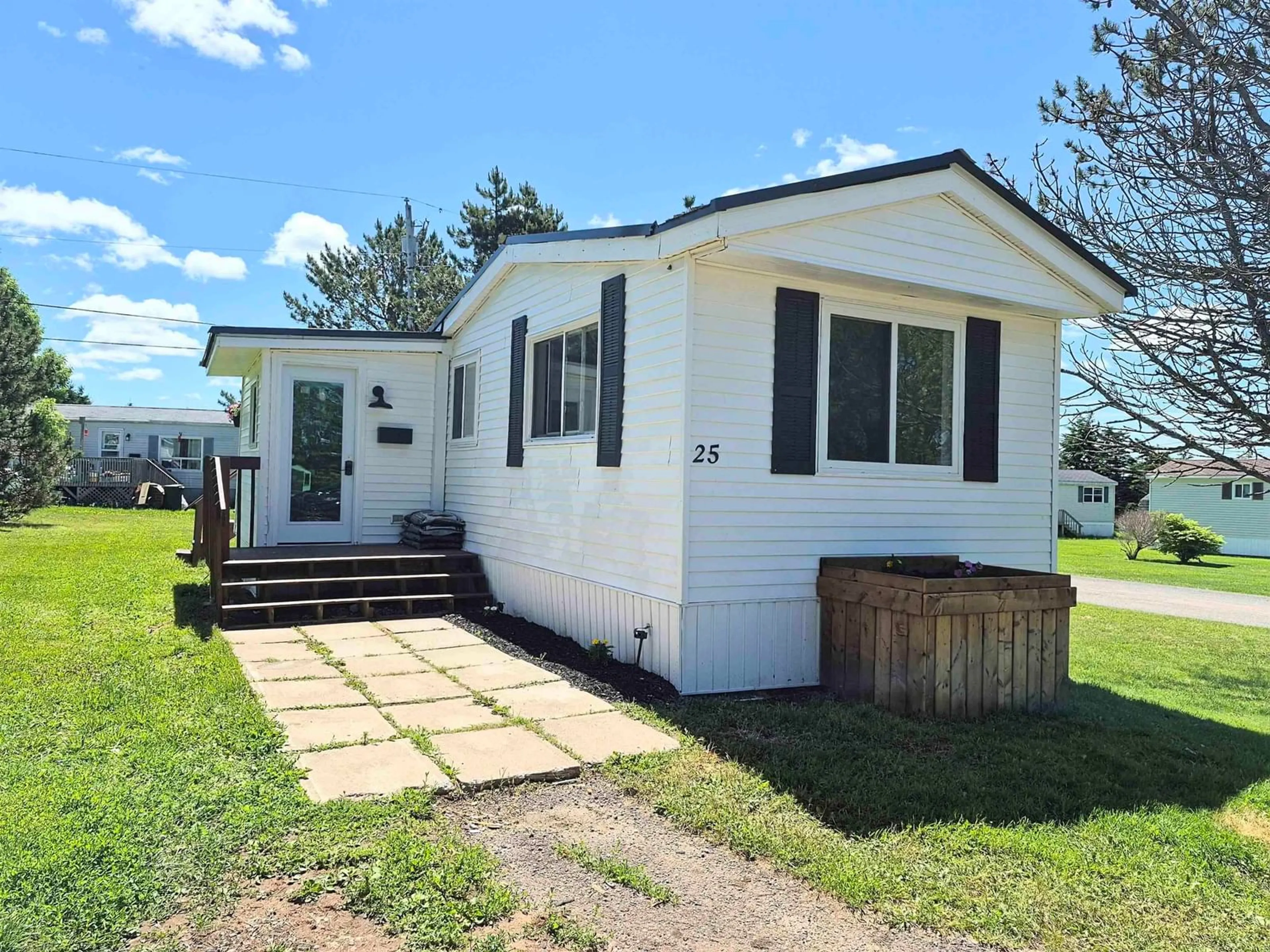 Home with vinyl exterior material, street for 25 Brentwood Estate, Amherst Nova Scotia B4H 4G5