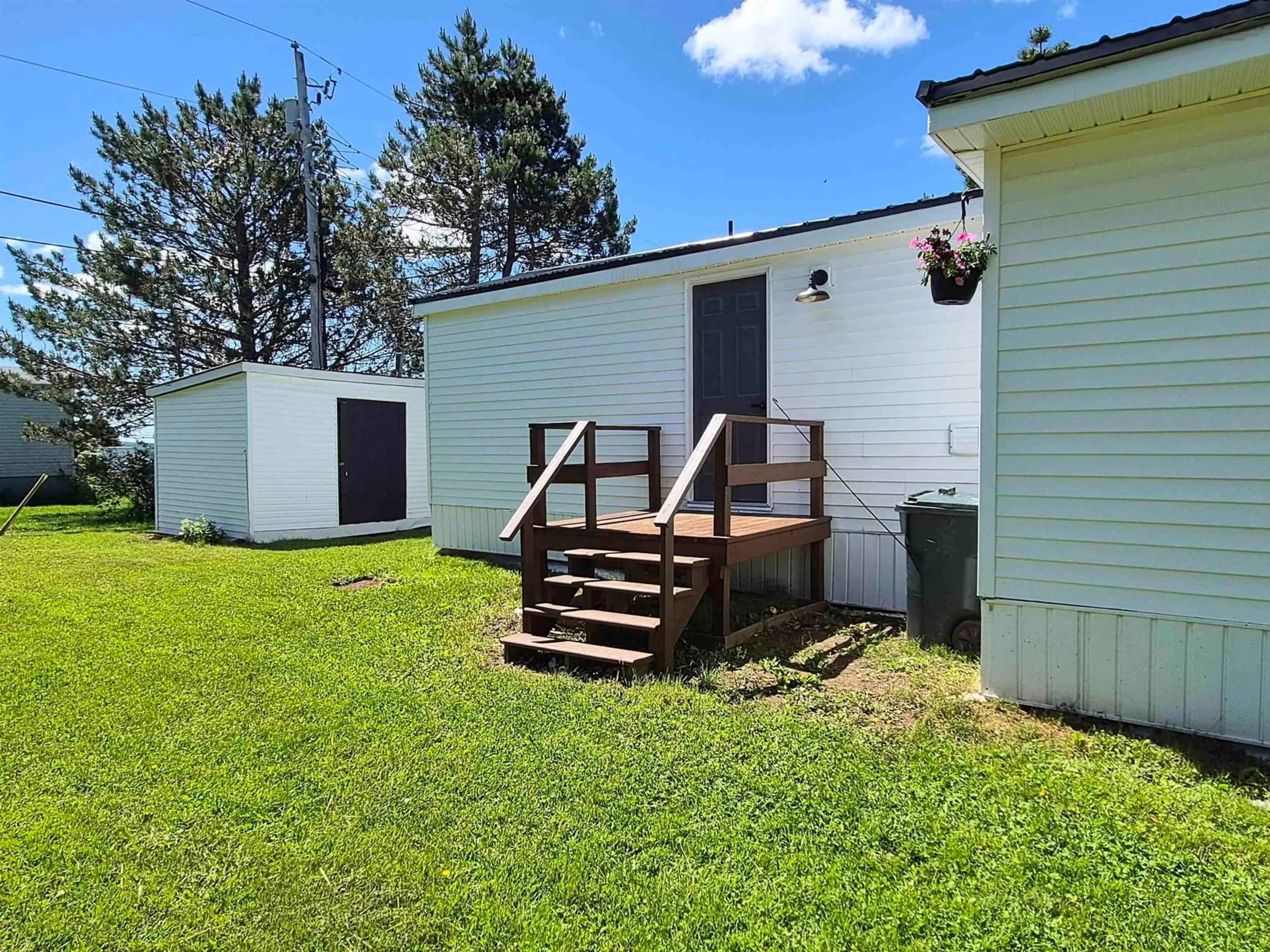 A pic from outside/outdoor area/front of a property/back of a property/a pic from drone, water/lake/river/ocean view for 25 Brentwood Estate, Amherst Nova Scotia B4H 4G5