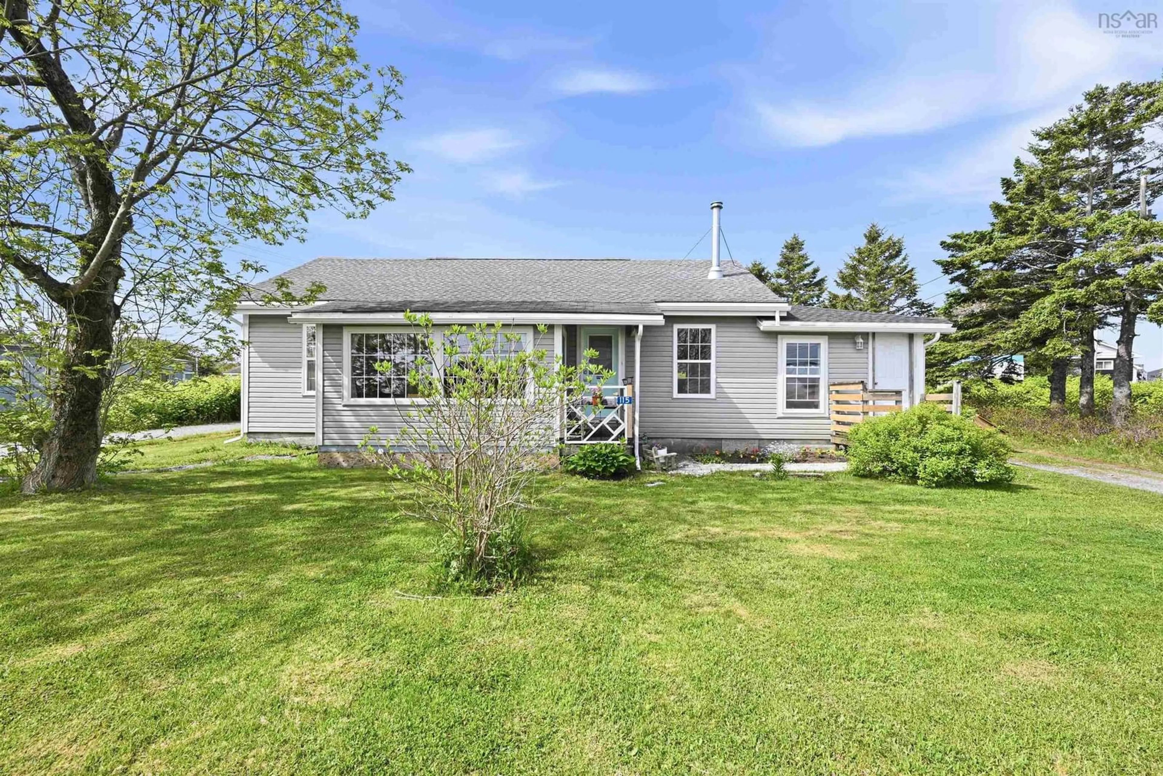 Home with vinyl exterior material, street for 115 Sandy Cove Rd, Terence Bay Nova Scotia B3T 1Y4