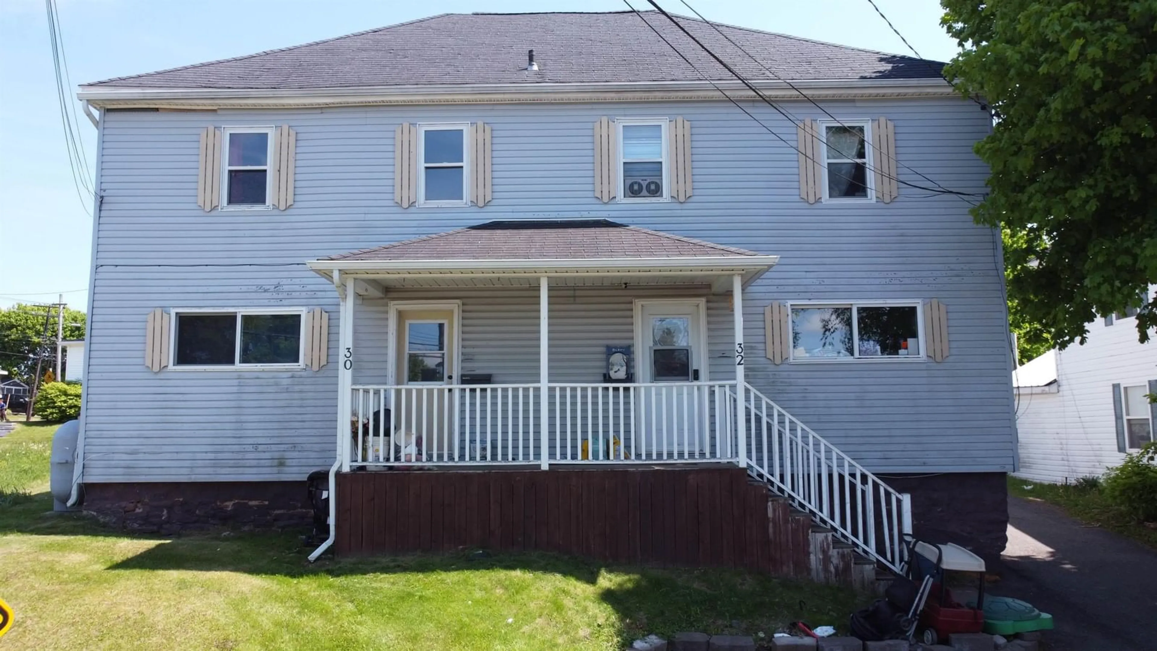 Home with vinyl exterior material, street for 30-32 West Pleasant St, Amherst Nova Scotia B4H 1E4
