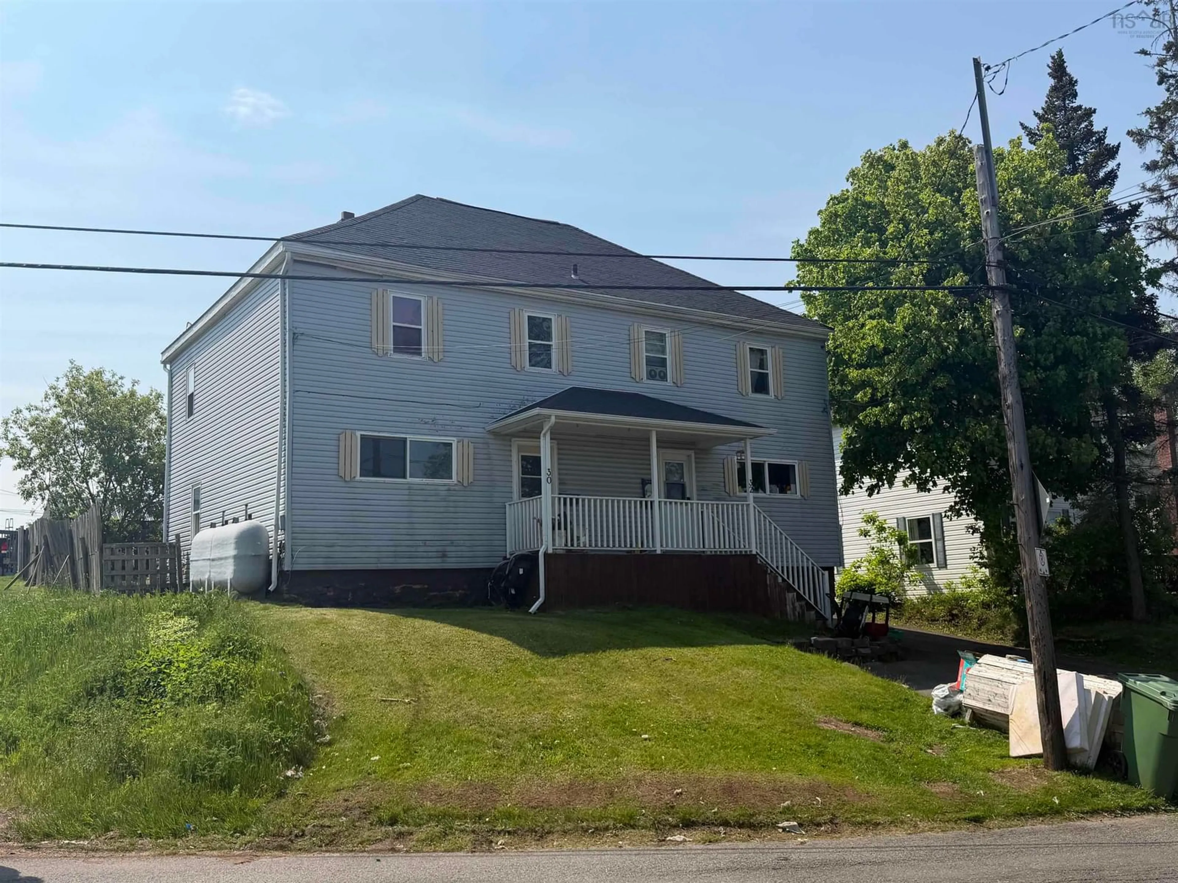 Home with vinyl exterior material, street for 30-32 West Pleasant St, Amherst Nova Scotia B4H 1E4