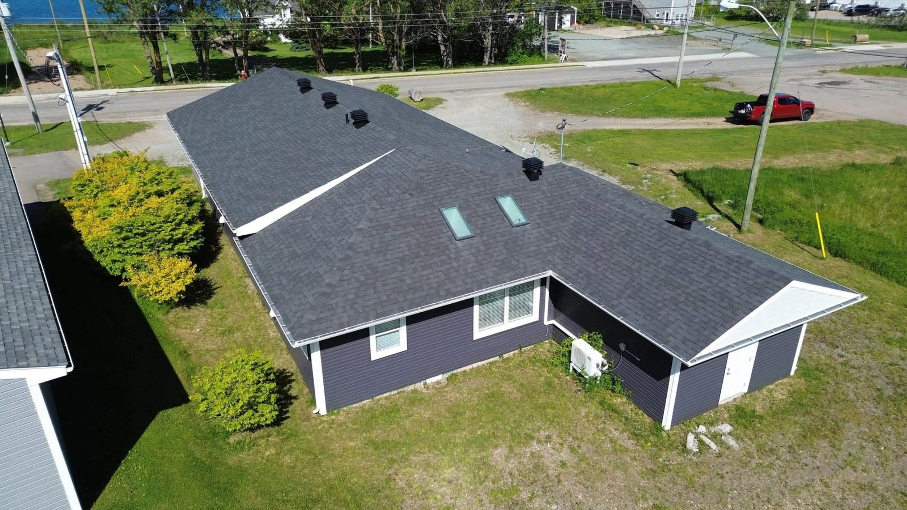 A pic from outside/outdoor area/front of a property/back of a property/a pic from drone, building for 136 Main St, Port Hood Nova Scotia B0E 2W0