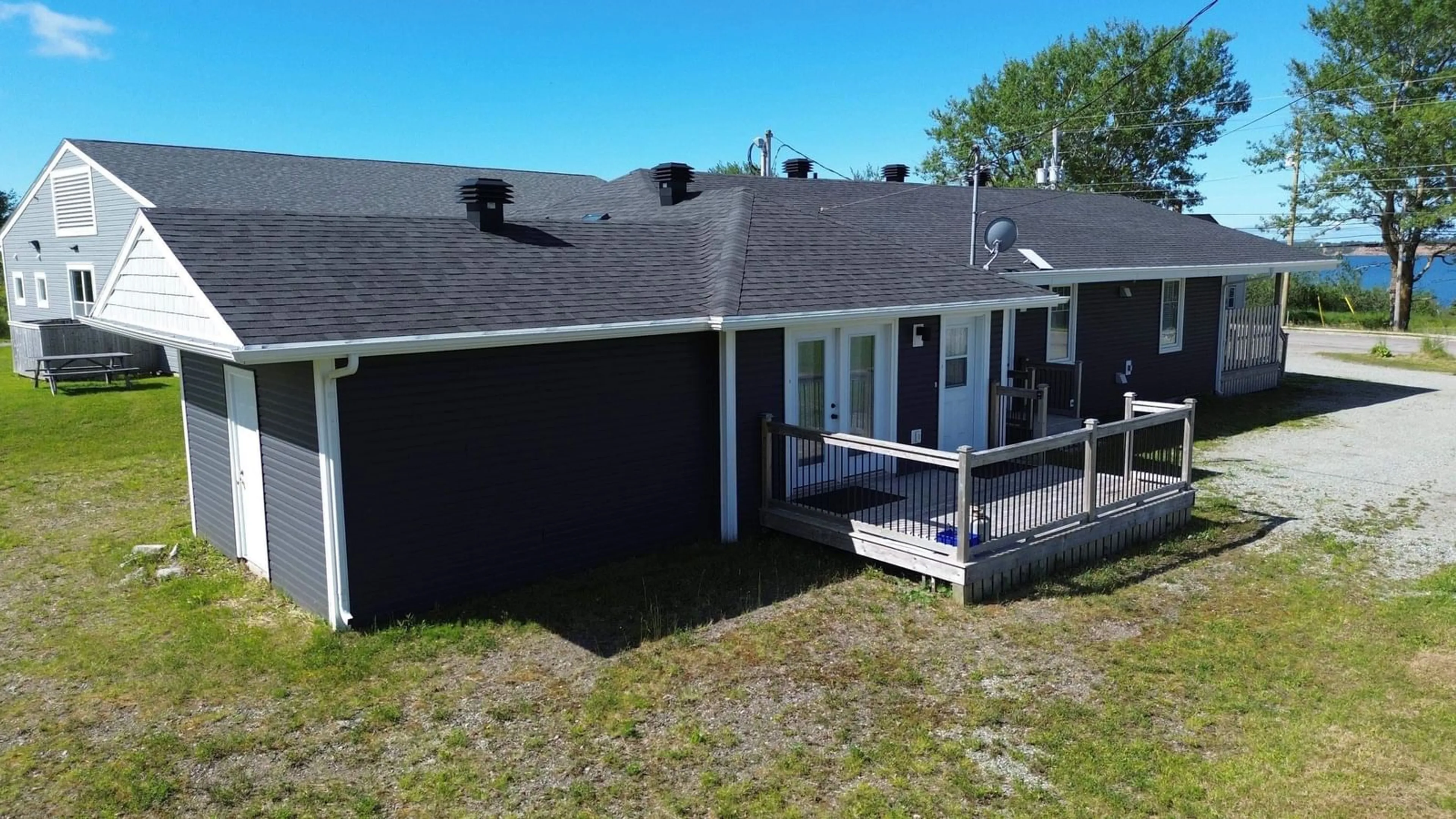A pic from outside/outdoor area/front of a property/back of a property/a pic from drone, unknown for 136 Main St, Port Hood Nova Scotia B0E 2W0