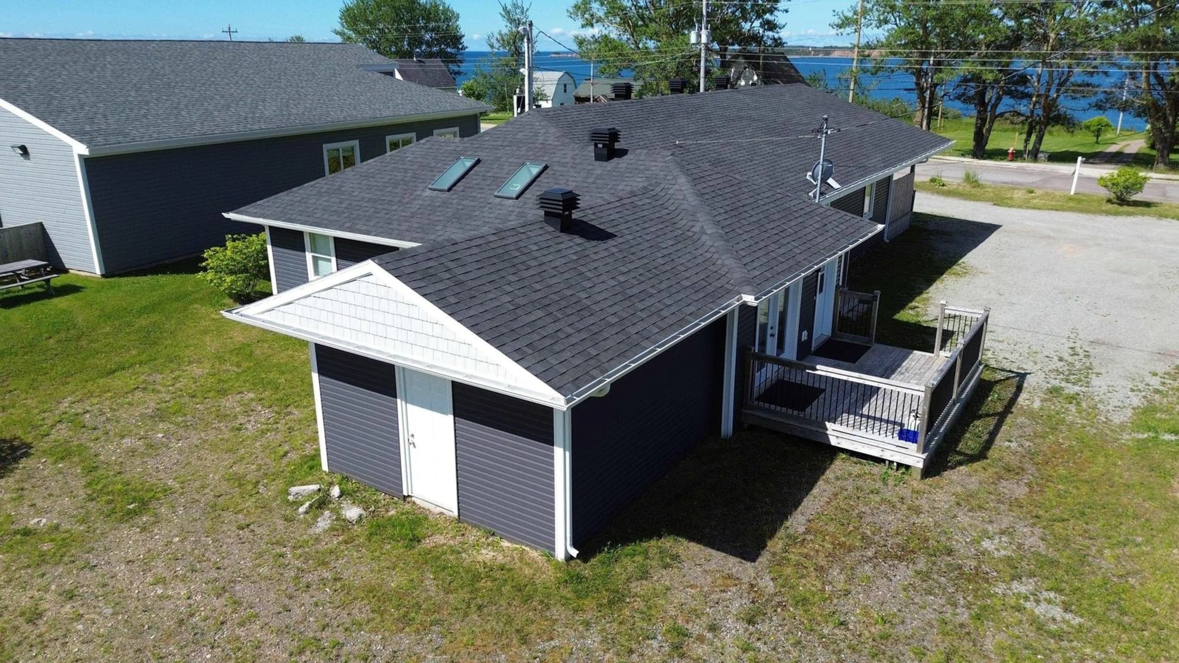 A pic from outside/outdoor area/front of a property/back of a property/a pic from drone, building for 136 Main St, Port Hood Nova Scotia B0E 2W0