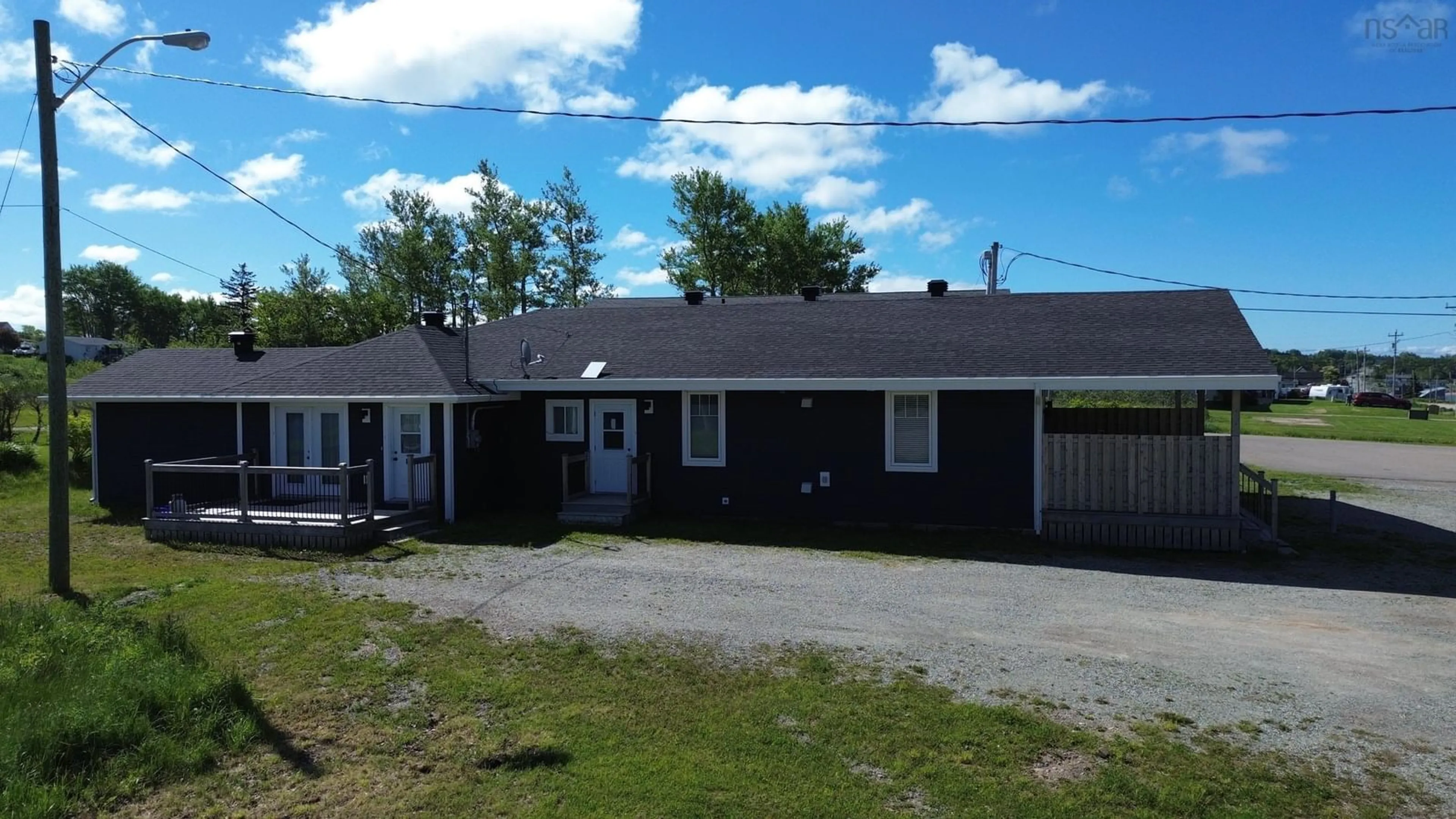 A pic from outside/outdoor area/front of a property/back of a property/a pic from drone, building for 136 Main St, Port Hood Nova Scotia B0E 2W0