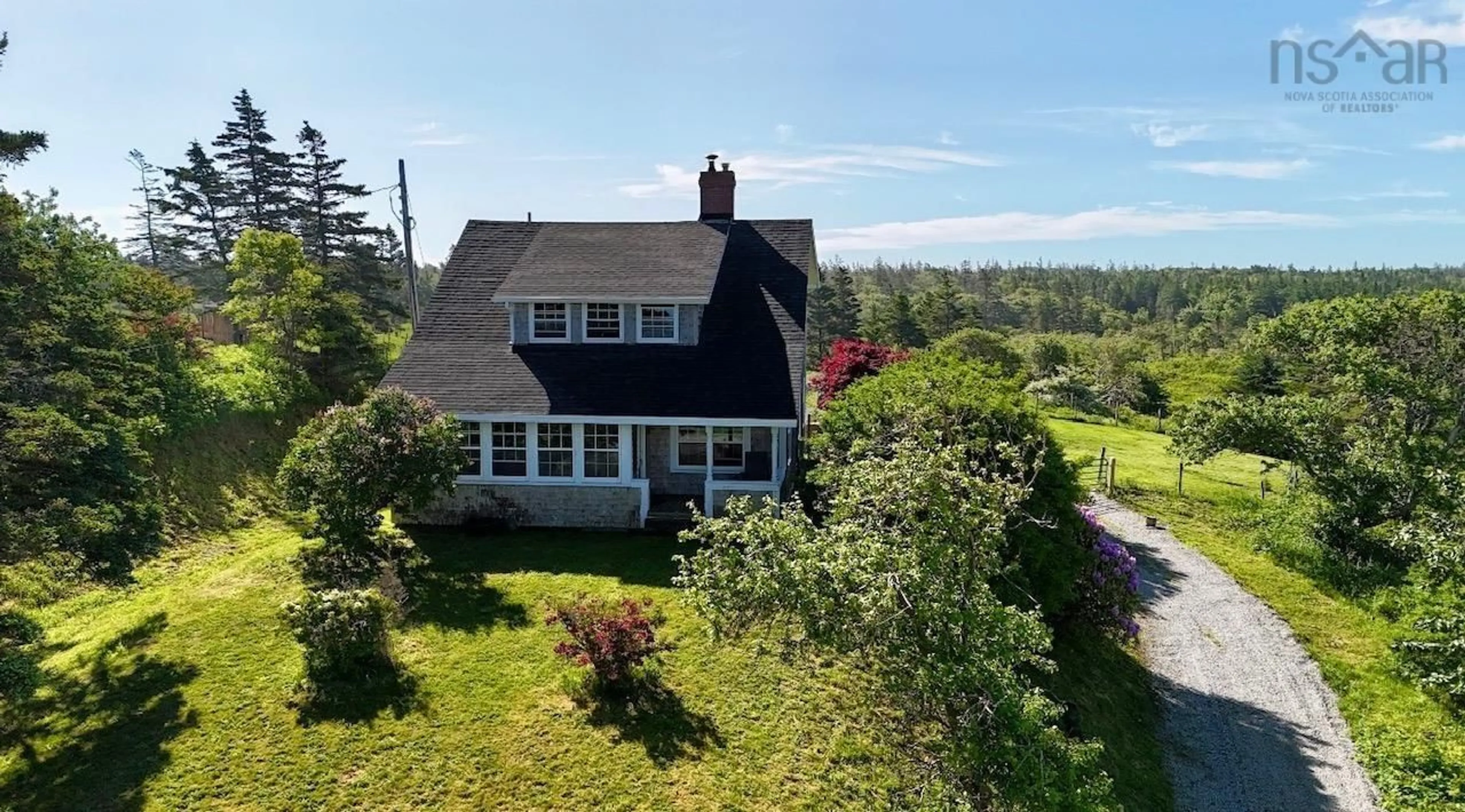 A pic from outside/outdoor area/front of a property/back of a property/a pic from drone, water/lake/river/ocean view for 373 Lake Darling Rd, Short Beach Nova Scotia B5A 5L1