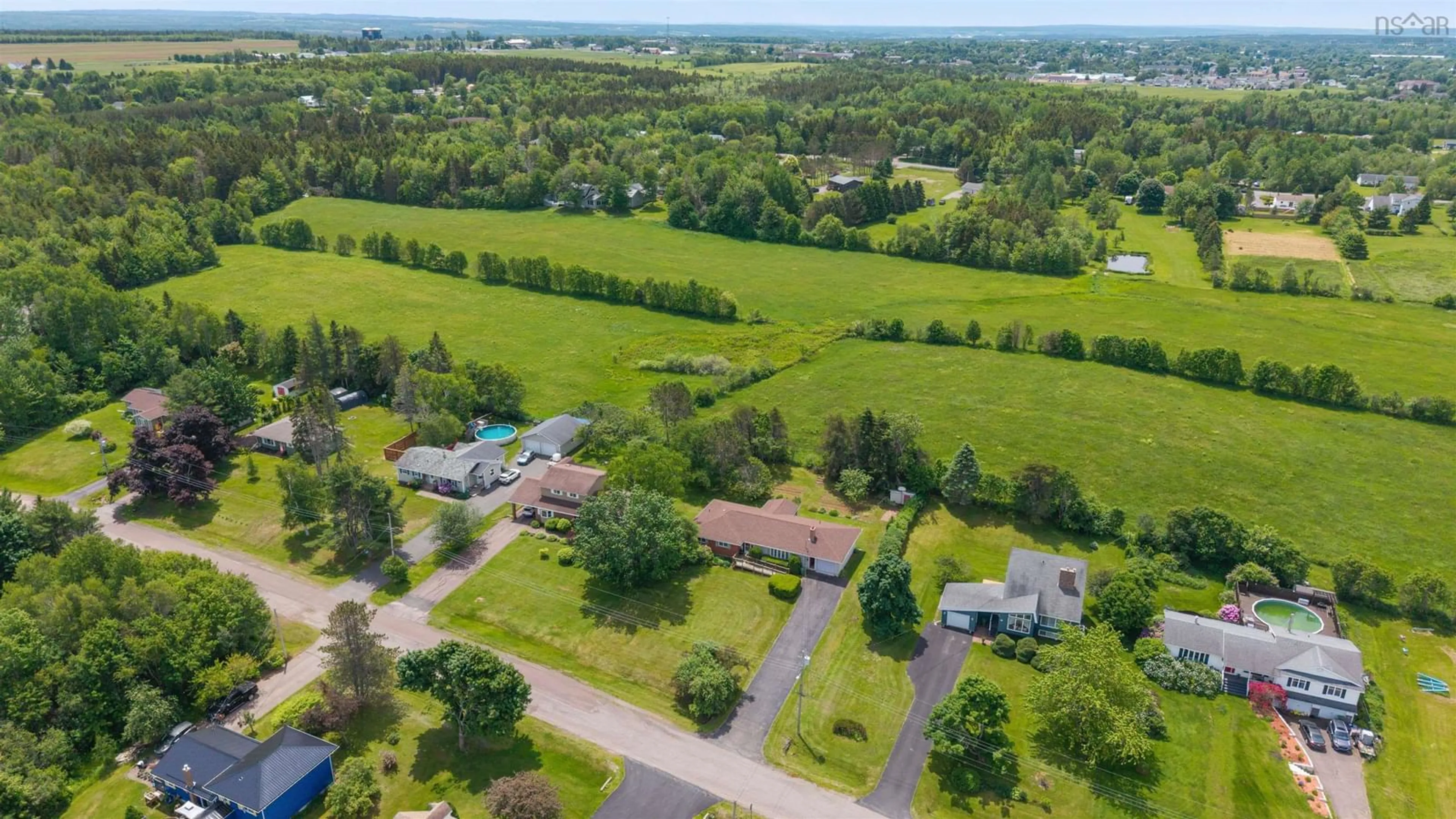 A pic from outside/outdoor area/front of a property/back of a property/a pic from drone, water/lake/river/ocean view for 44 Meadow Park Dr, East Amherst Nova Scotia B4H 3Y2