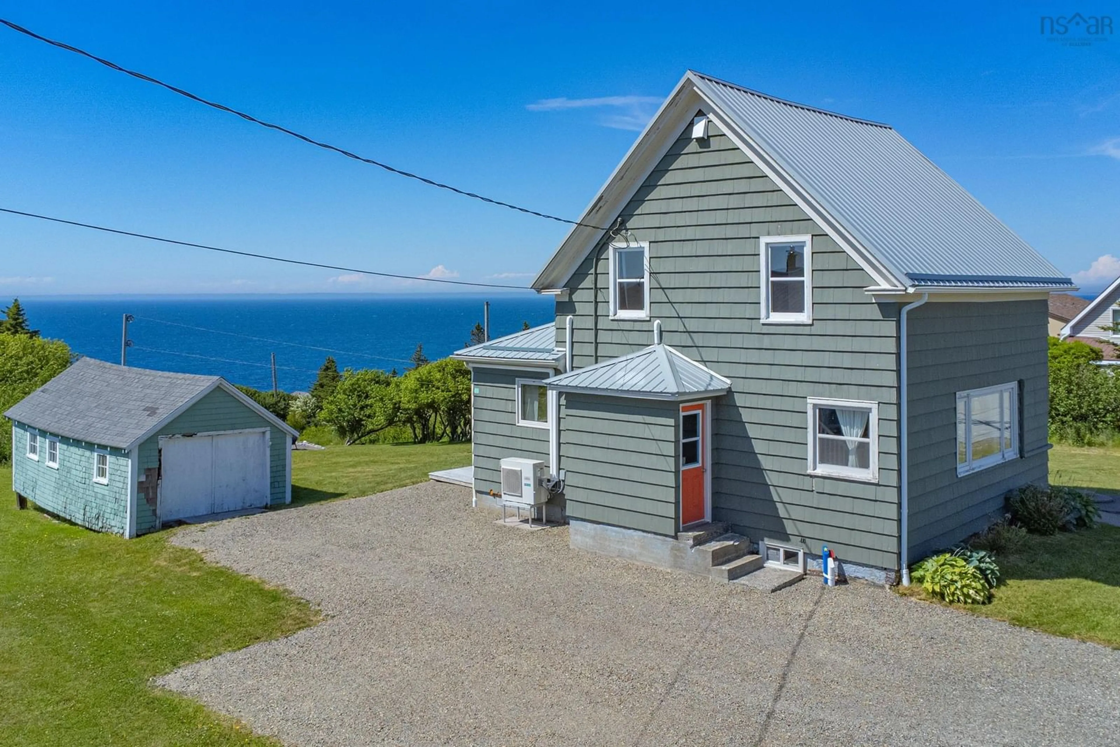 A pic from outside/outdoor area/front of a property/back of a property/a pic from drone, water/lake/river/ocean view for 7919 Highway 1, Meteghan Nova Scotia B0W 2J0