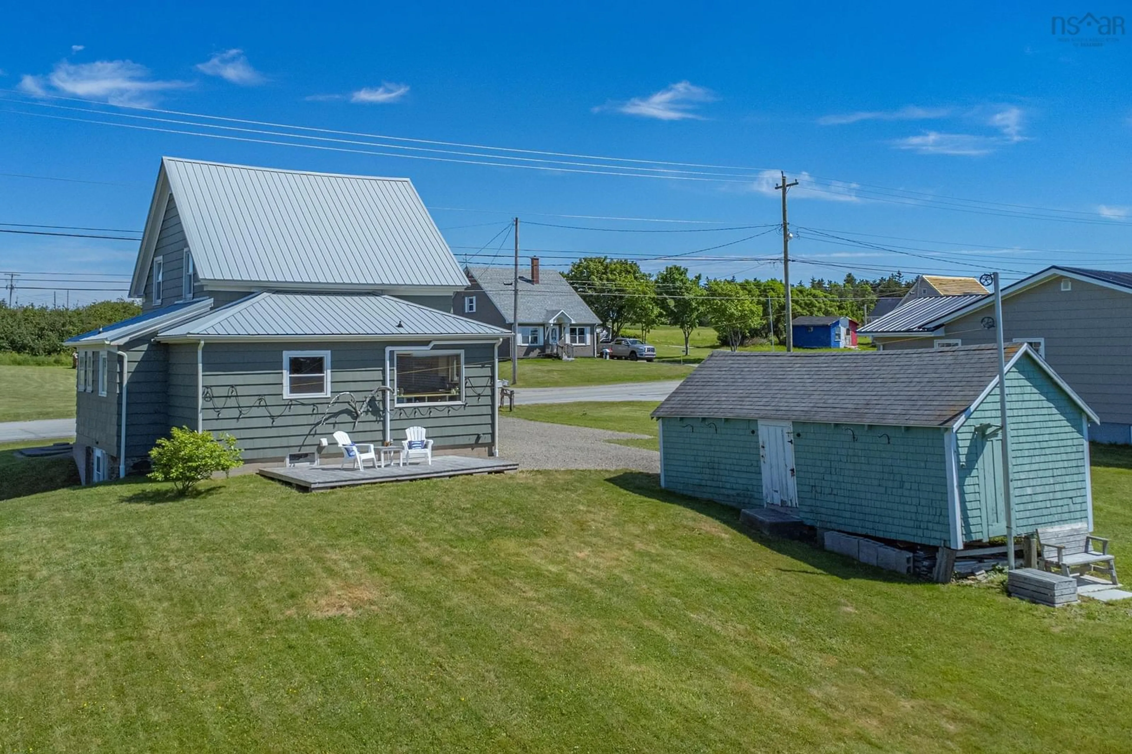 A pic from outside/outdoor area/front of a property/back of a property/a pic from drone, unknown for 7919 Highway 1, Meteghan Nova Scotia B0W 2J0