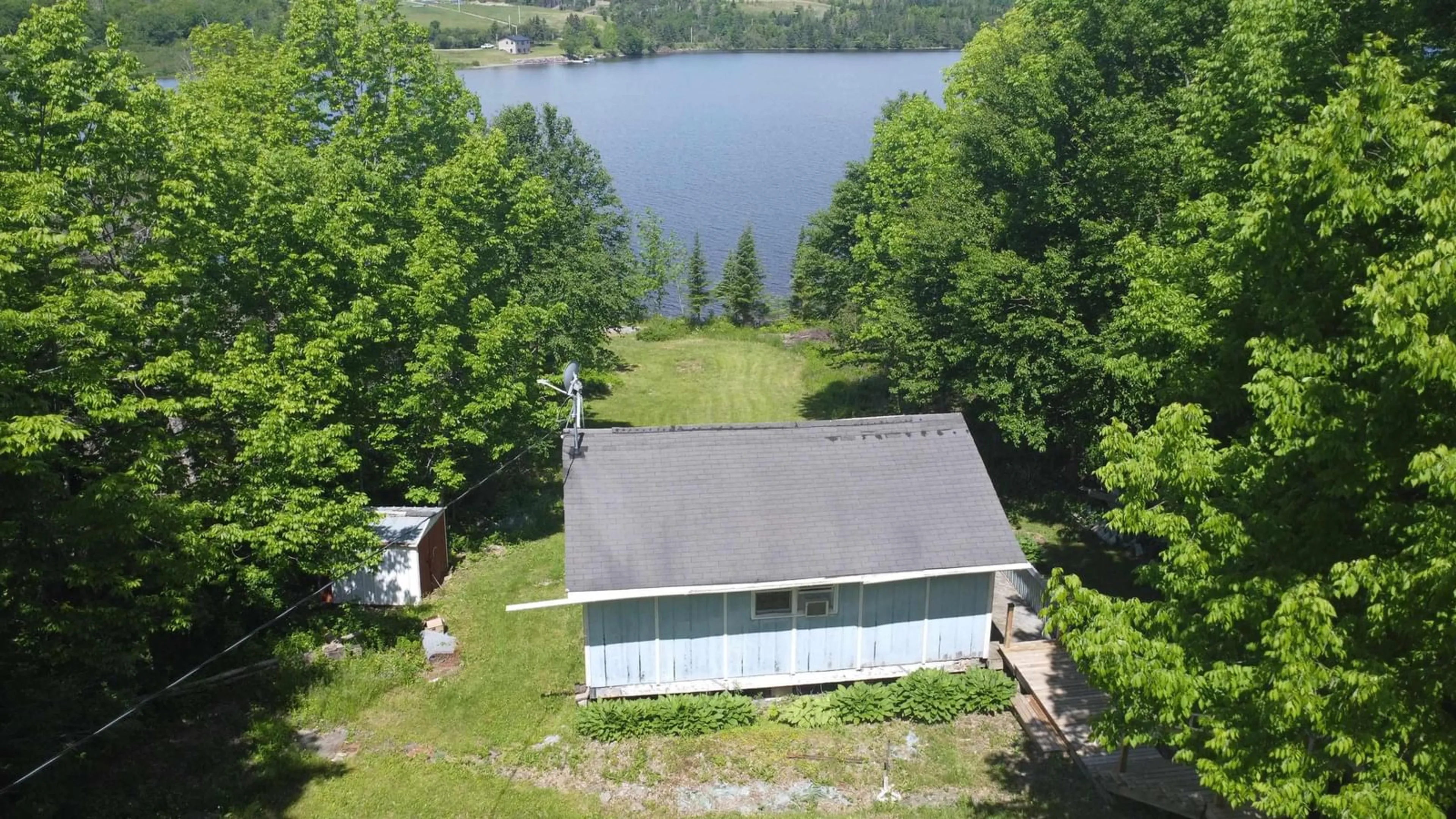 A pic from outside/outdoor area/front of a property/back of a property/a pic from drone, water/lake/river/ocean view for 100 Loon Lake Road, Loch Katrine Nova Scotia B0H 1M0