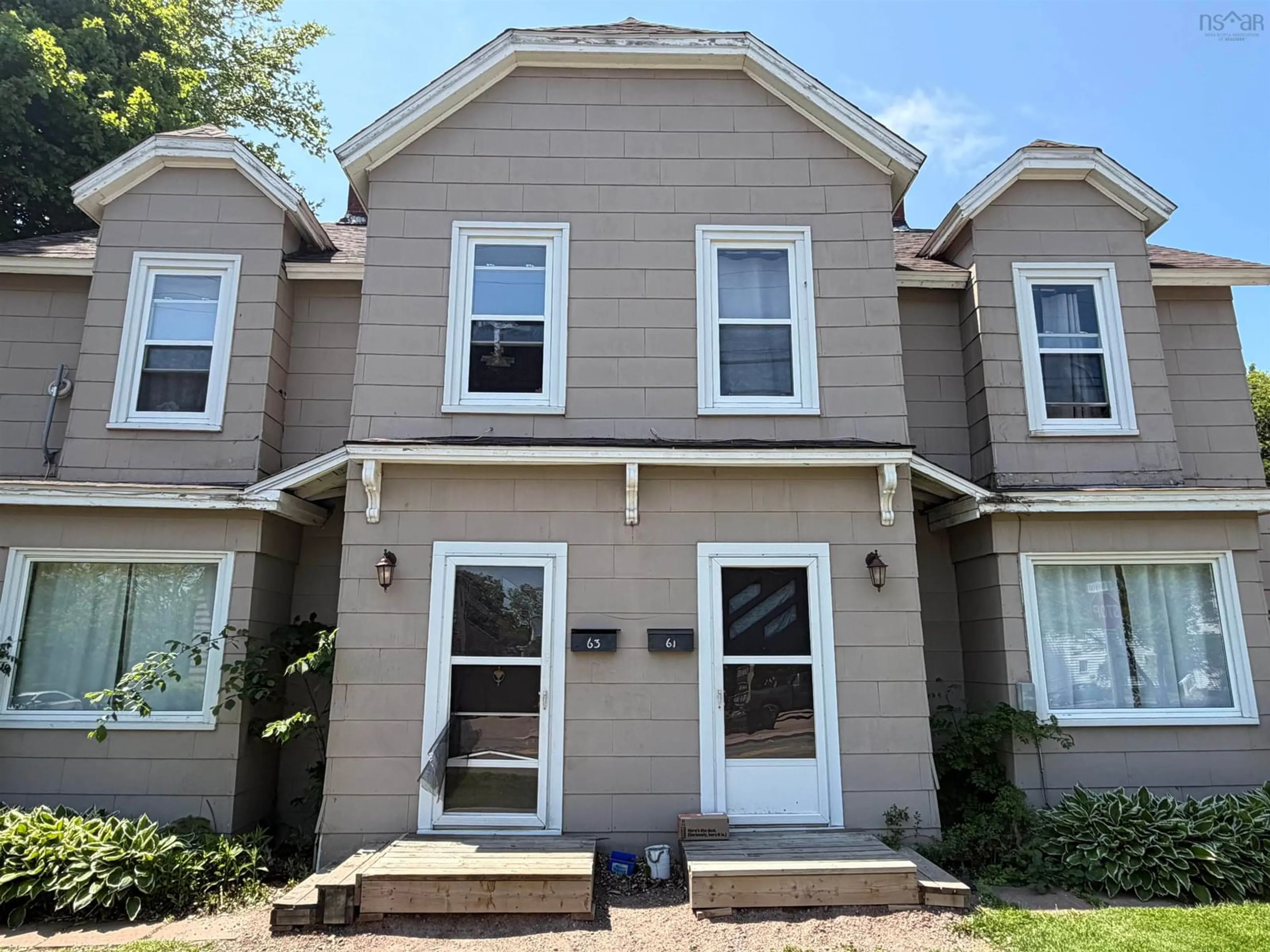 Home with vinyl exterior material, street for 61-63 Albion St, Amherst Nova Scotia B4H 2W2