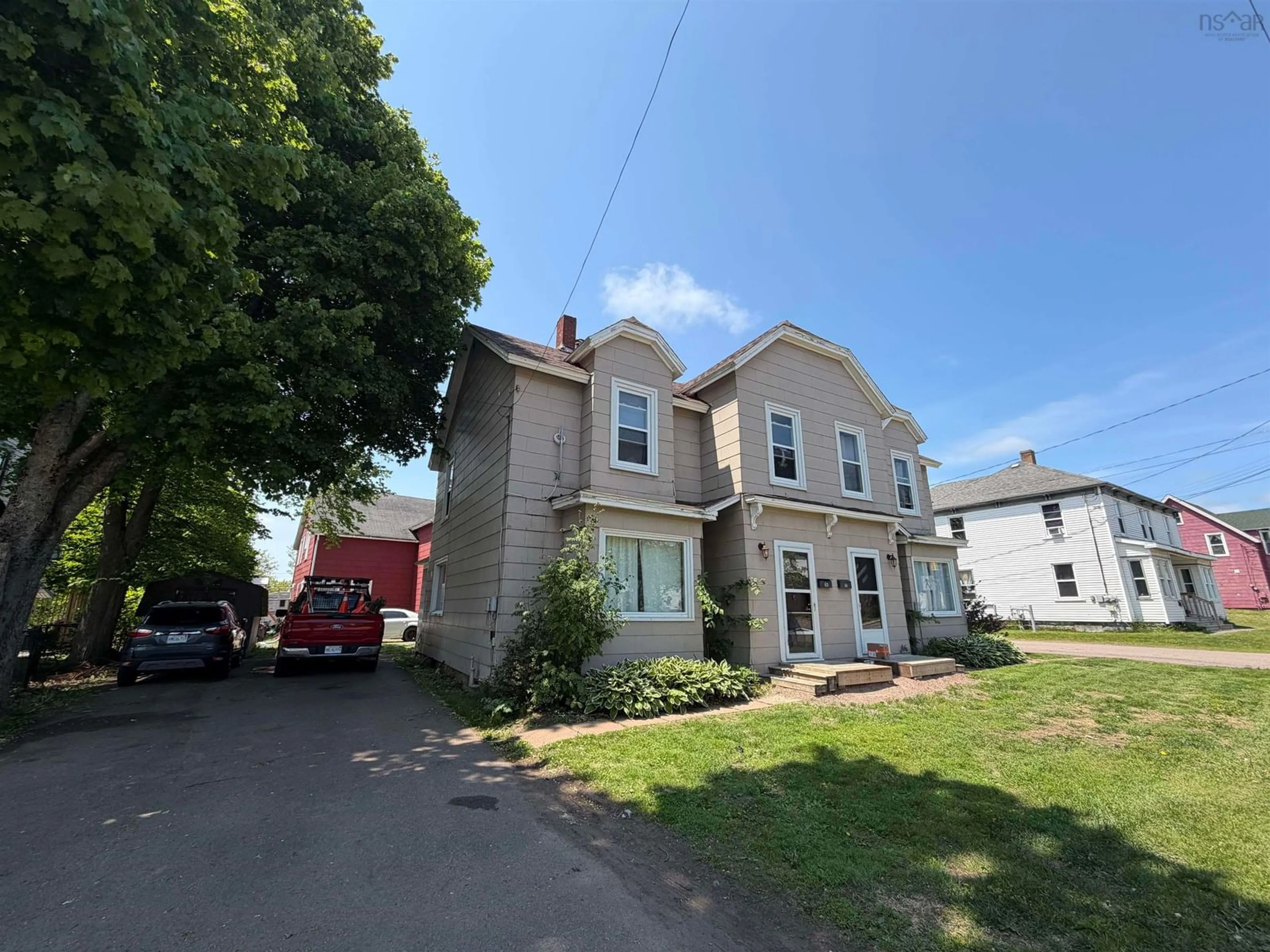 A pic from outside/outdoor area/front of a property/back of a property/a pic from drone, building for 61-63 Albion St, Amherst Nova Scotia B4H 2W2