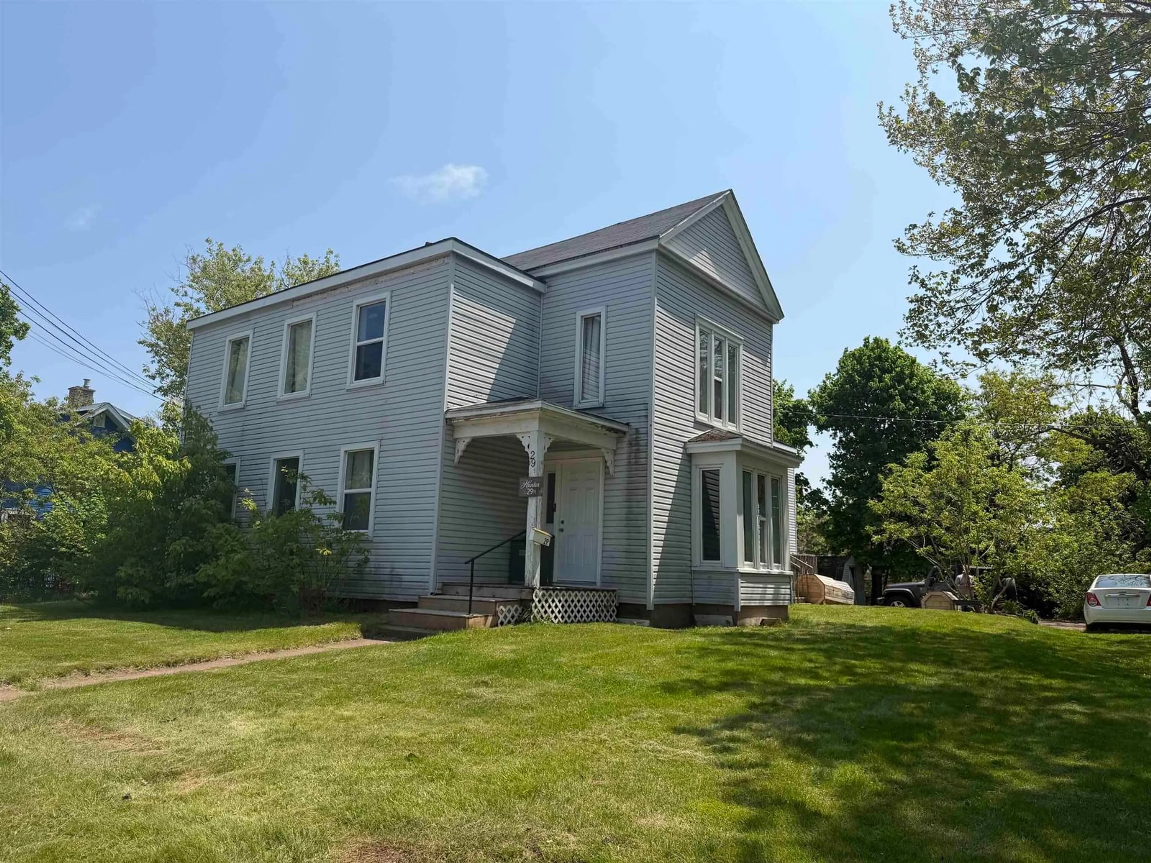 A pic from outside/outdoor area/front of a property/back of a property/a pic from drone, building for 29 Spring St, Amherst Nova Scotia B4H 1R8