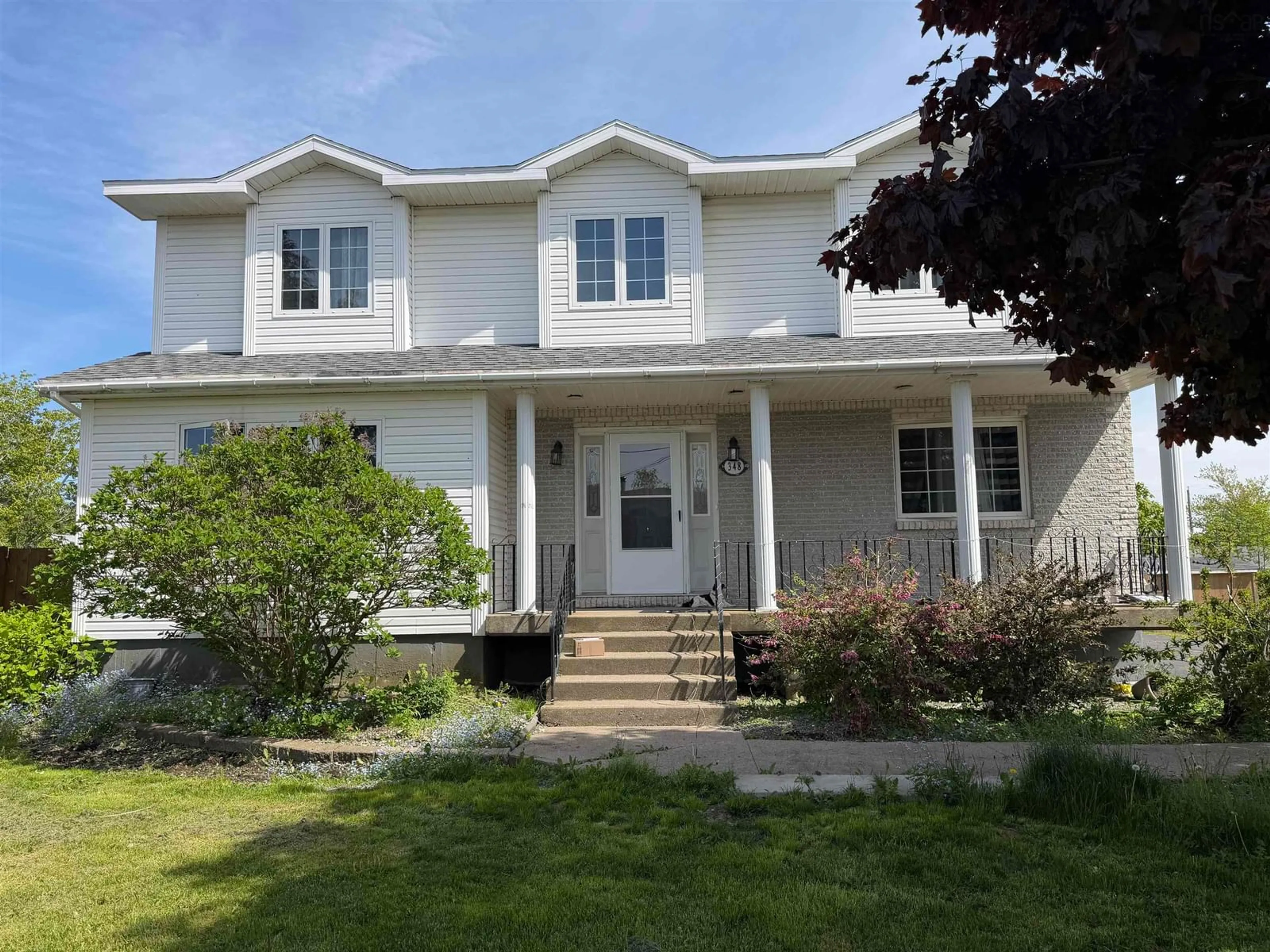 Home with vinyl exterior material, street for 348 Cartier St, Sydney Nova Scotia B1P 4B8
