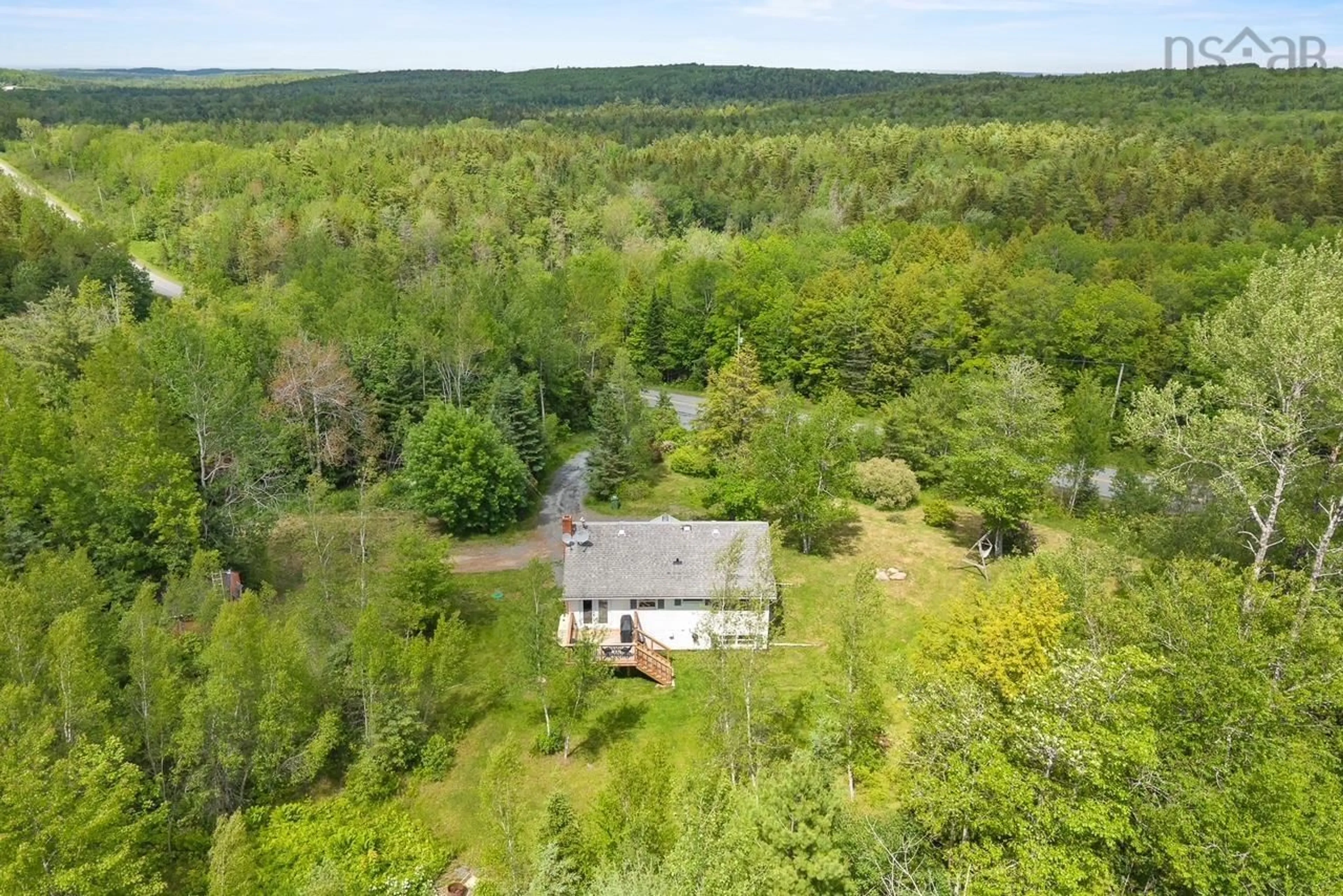 A pic from outside/outdoor area/front of a property/back of a property/a pic from drone, forest/trees view for 1199 Antrim Rd, Carrolls Corner Nova Scotia B0N 1Y0