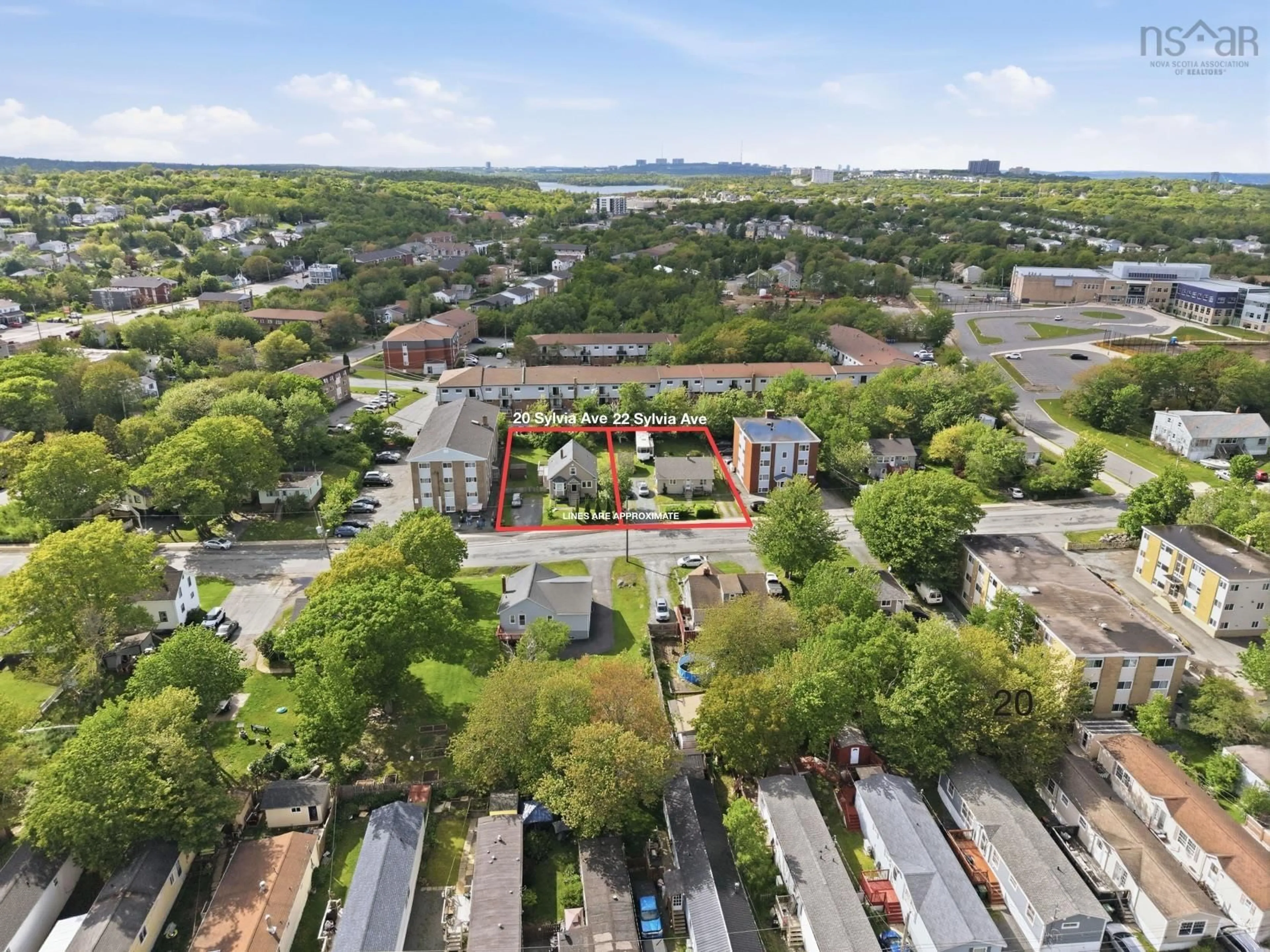 A pic from outside/outdoor area/front of a property/back of a property/a pic from drone, city buildings view from balcony for 20 Sylvia Ave, Spryfield Nova Scotia B3R 1J9