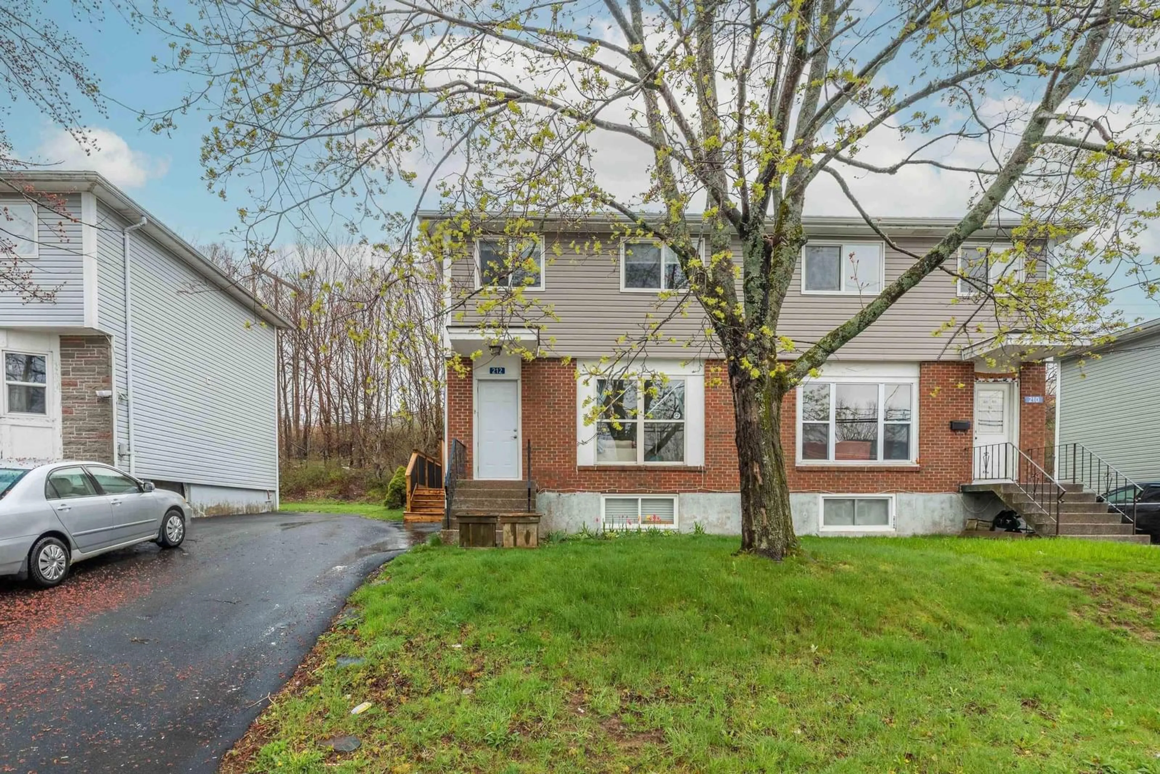 Home with vinyl exterior material, street for 212 Roleika Dr, Dartmouth Nova Scotia B2X 1M6