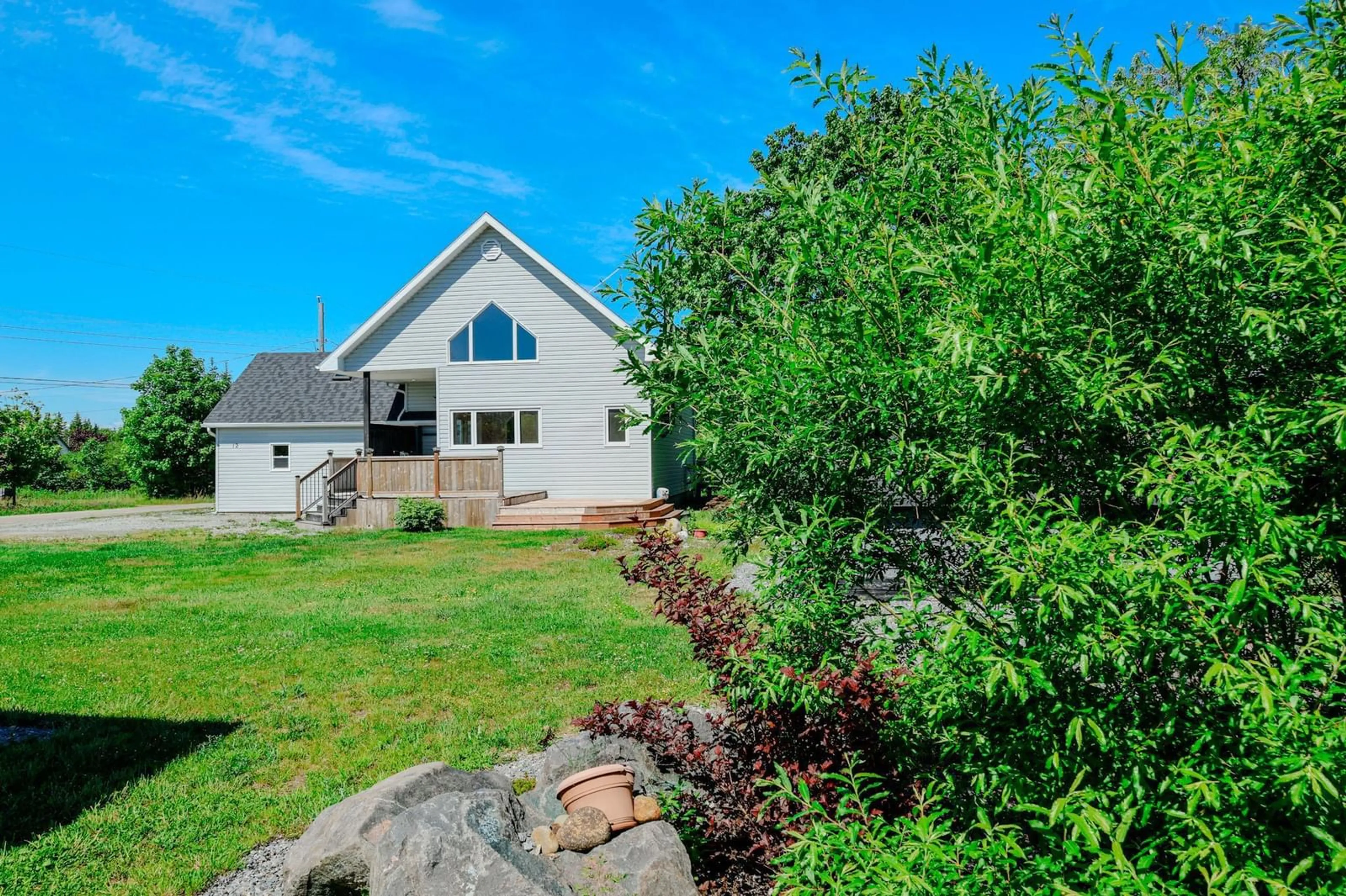 A pic from outside/outdoor area/front of a property/back of a property/a pic from drone, water/lake/river/ocean view for 12 Clam Point Rd, Clam Point Nova Scotia B0W 1N0