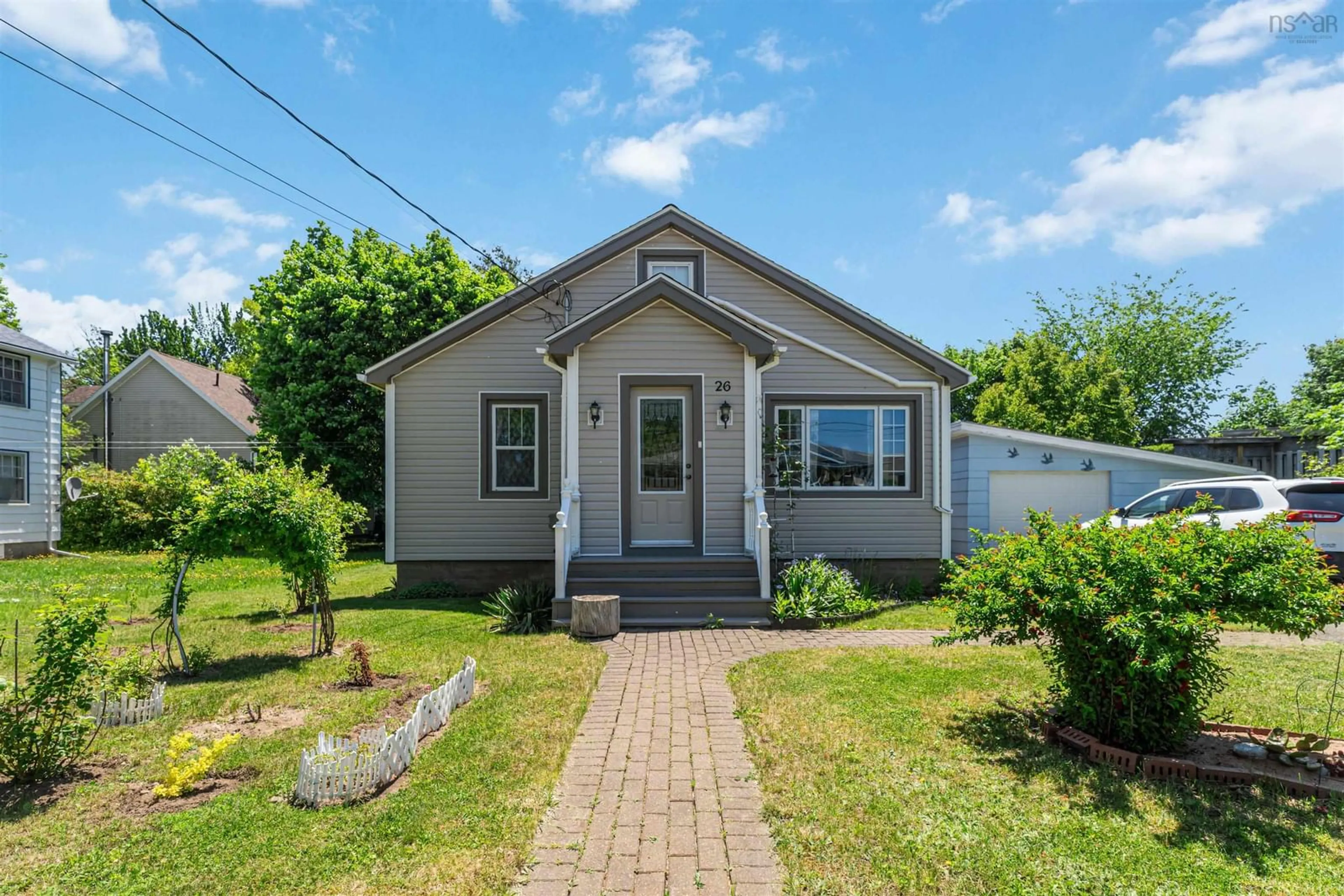 Home with vinyl exterior material, street for 26 Spring Garden Rd Middleton, Ns, Middleton Nova Scotia B0S 1P0