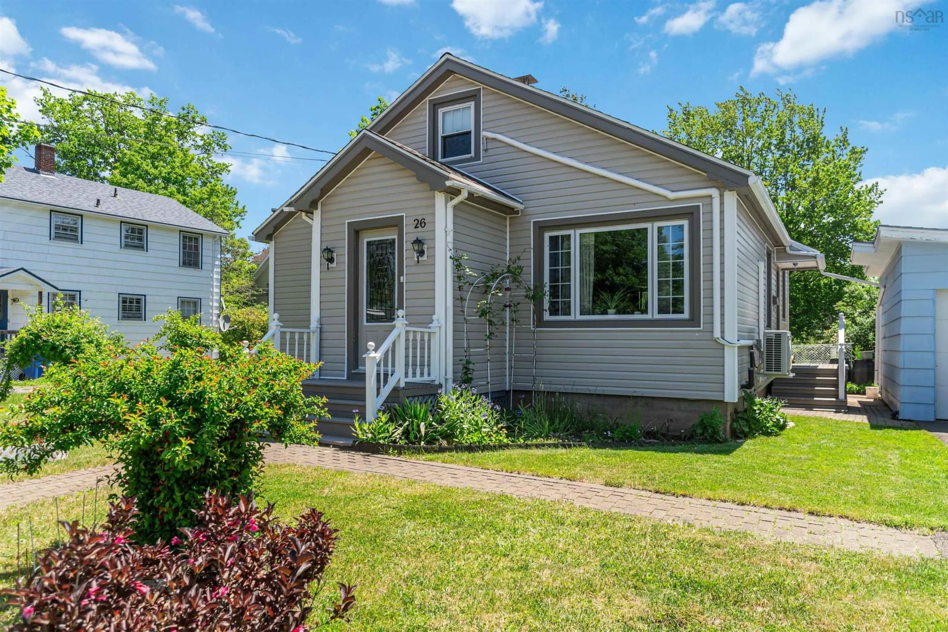 Home with vinyl exterior material, street for 26 Spring Garden Rd Middleton, Ns, Middleton Nova Scotia B0S 1P0