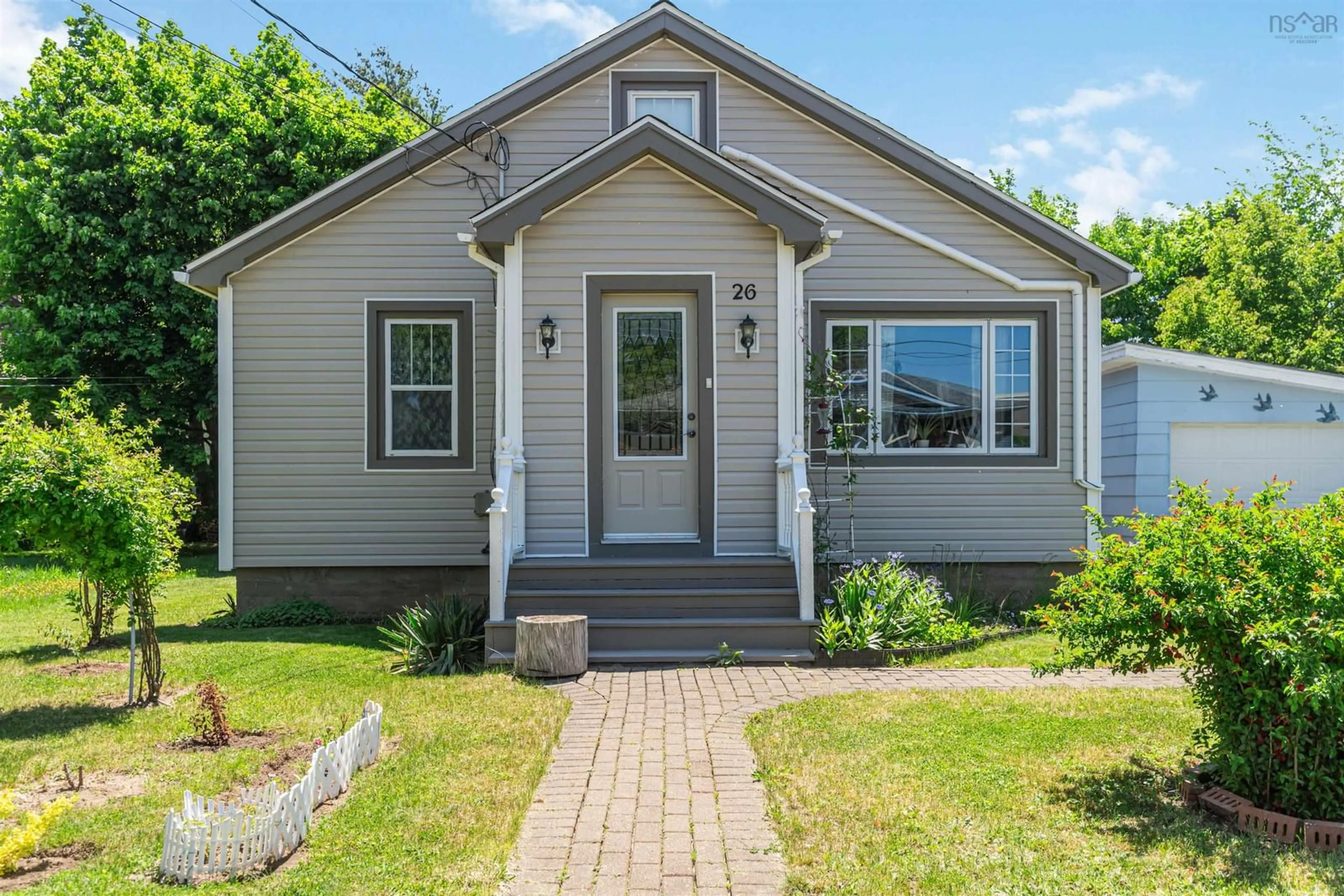 Home with vinyl exterior material, street for 26 Spring Garden Rd Middleton, Ns, Middleton Nova Scotia B0S 1P0