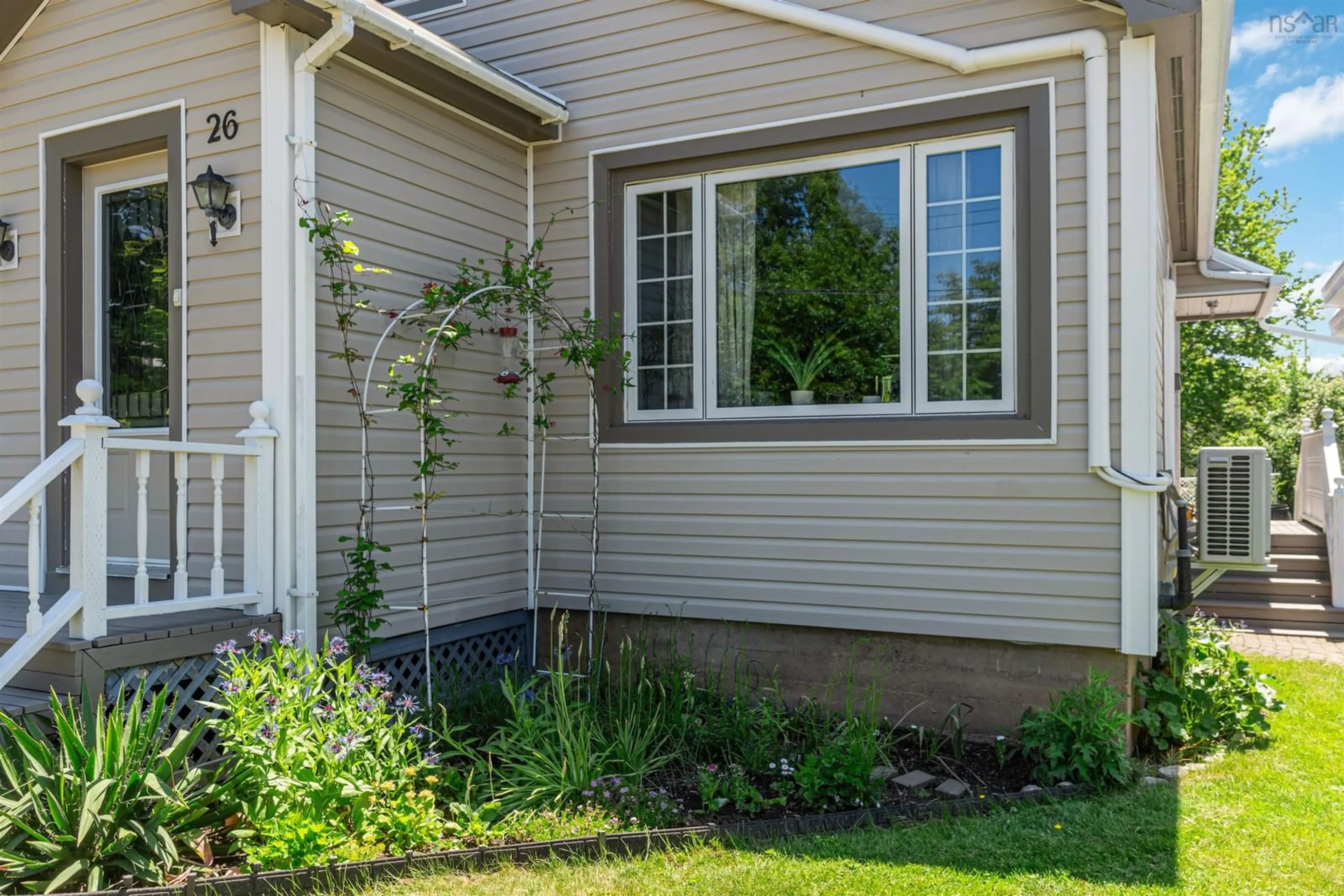 Home with vinyl exterior material, street for 26 Spring Garden Rd Middleton, Ns, Middleton Nova Scotia B0S 1P0