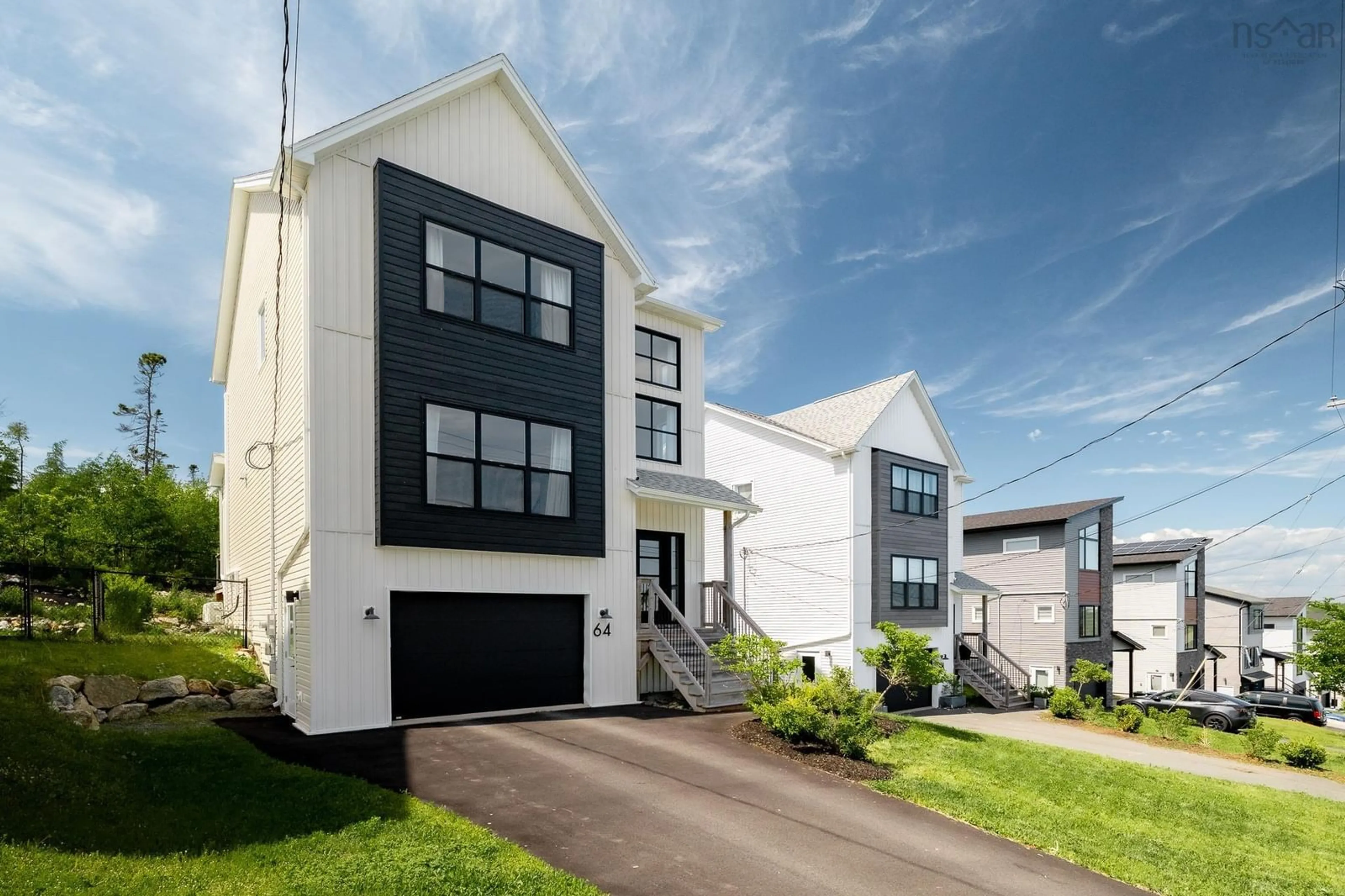 Home with vinyl exterior material, street for 64 Angler Dr, Herring Cove Nova Scotia B3R 0C8