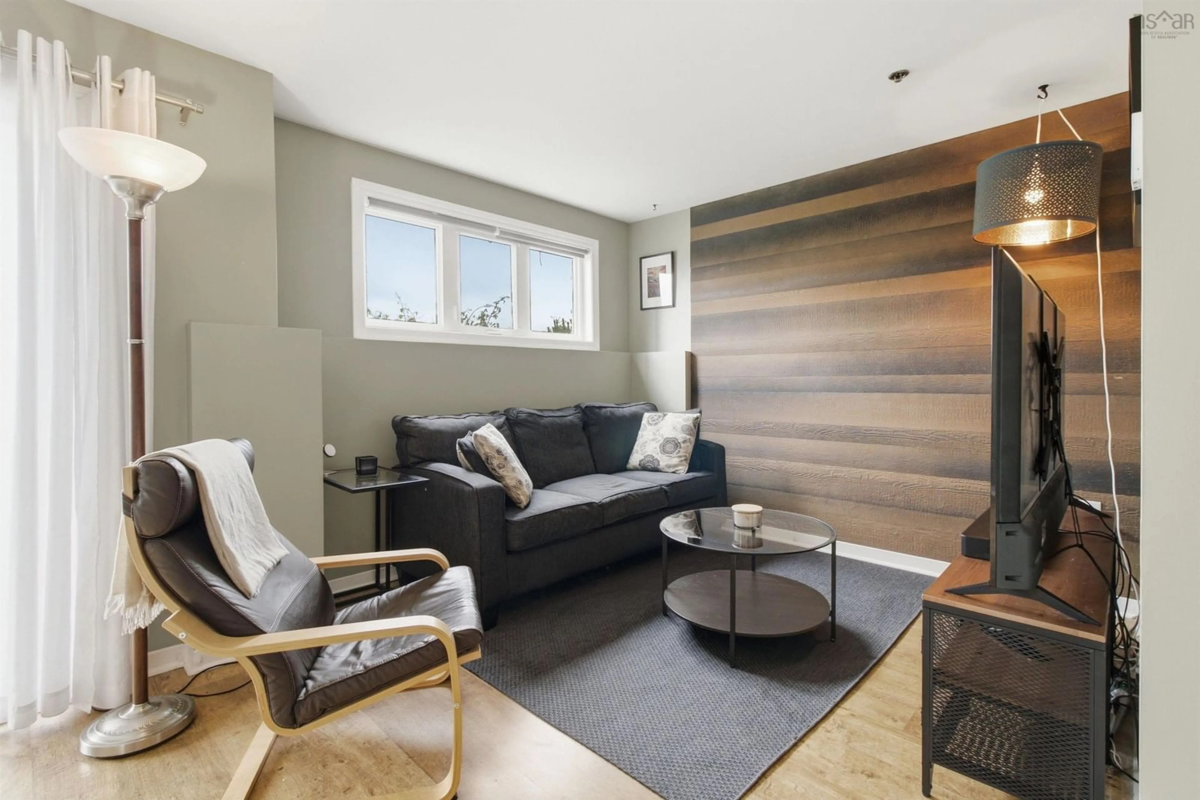Living room with furniture, wood/laminate floor for 3514 John Parr Dr, Halifax Peninsula Nova Scotia B3K 5V2