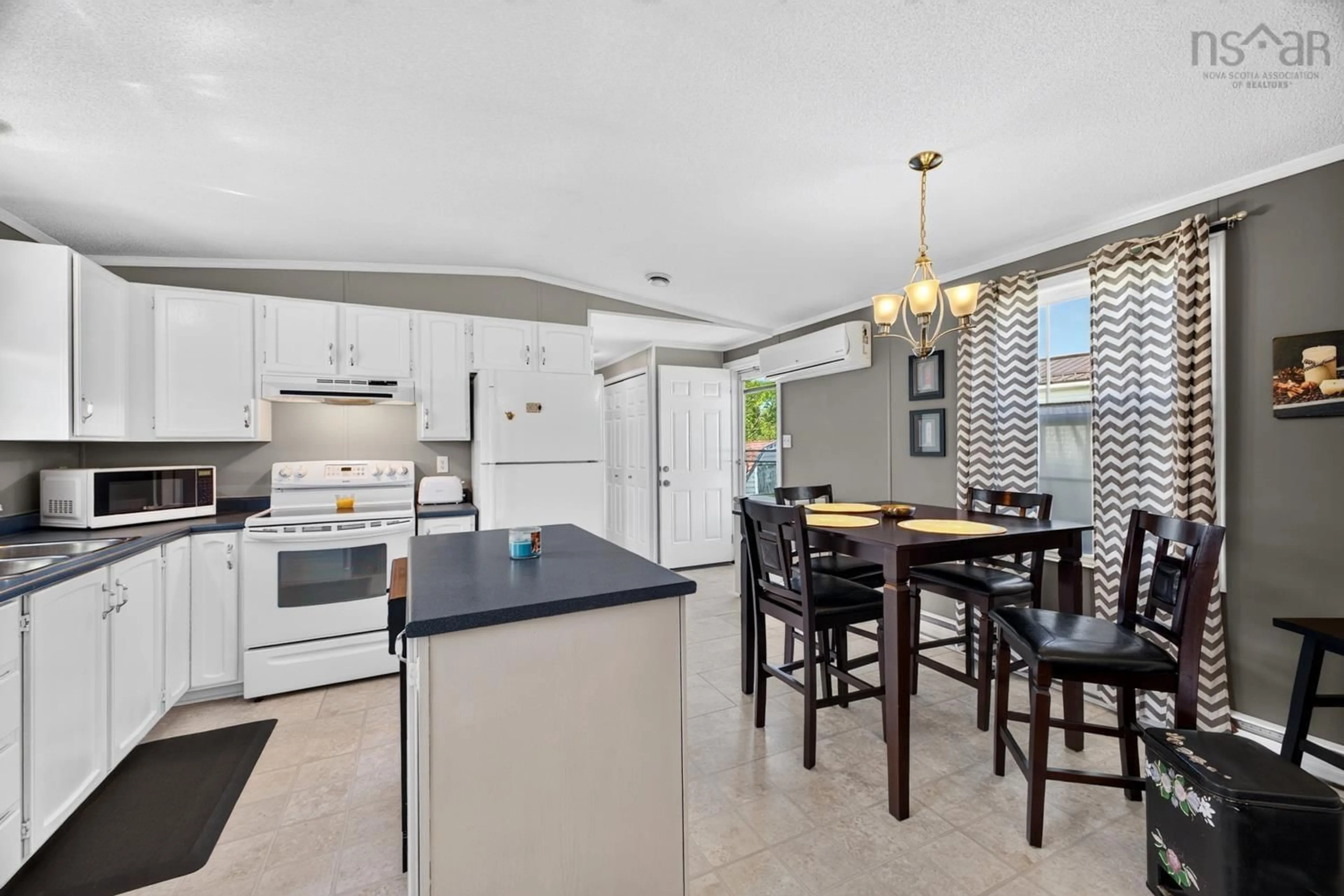 Open concept kitchen, ceramic/tile floor for 20 College Crt, Bible Hill Nova Scotia B2N 7G7