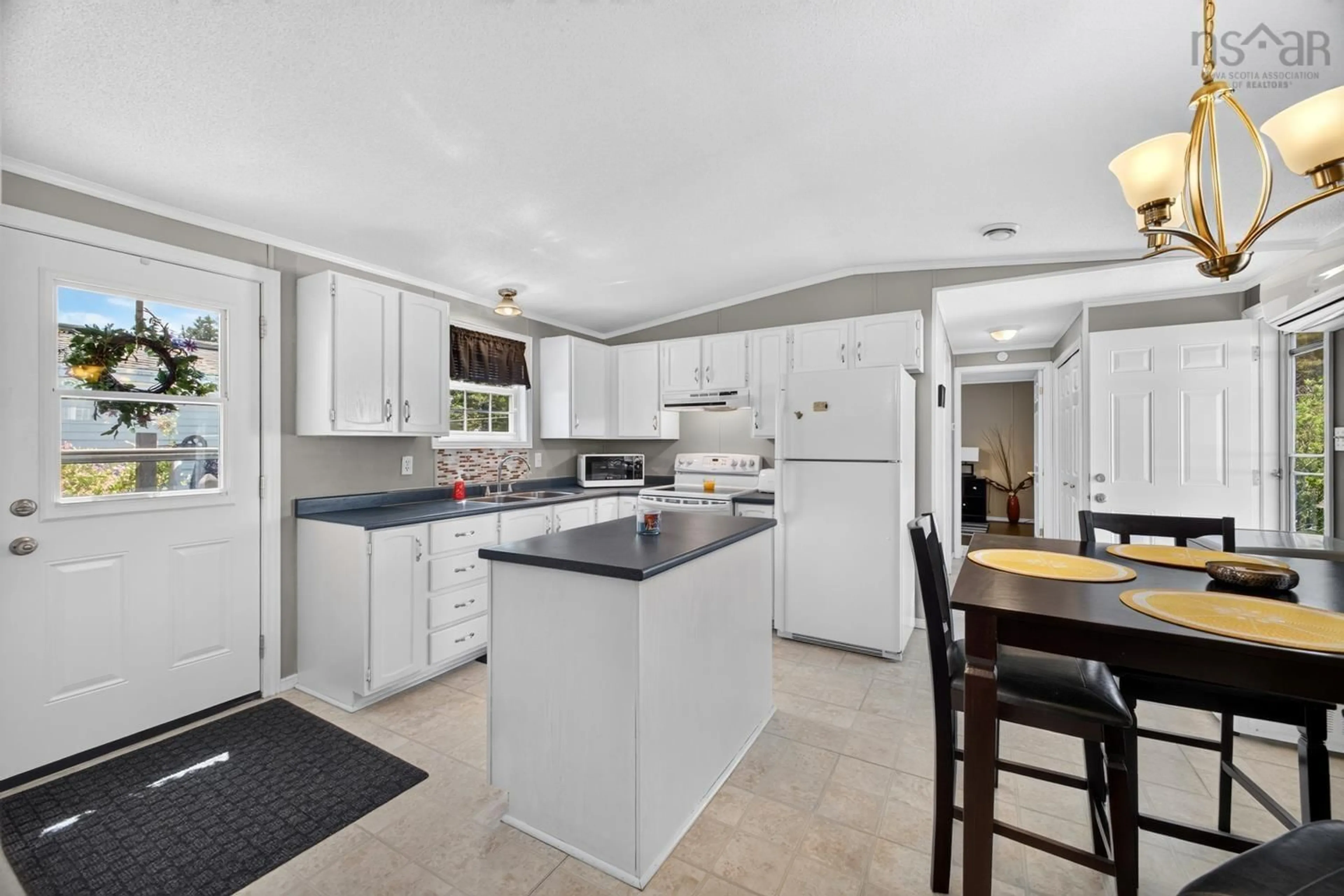 Open concept kitchen, ceramic/tile floor for 20 College Crt, Bible Hill Nova Scotia B2N 7G7