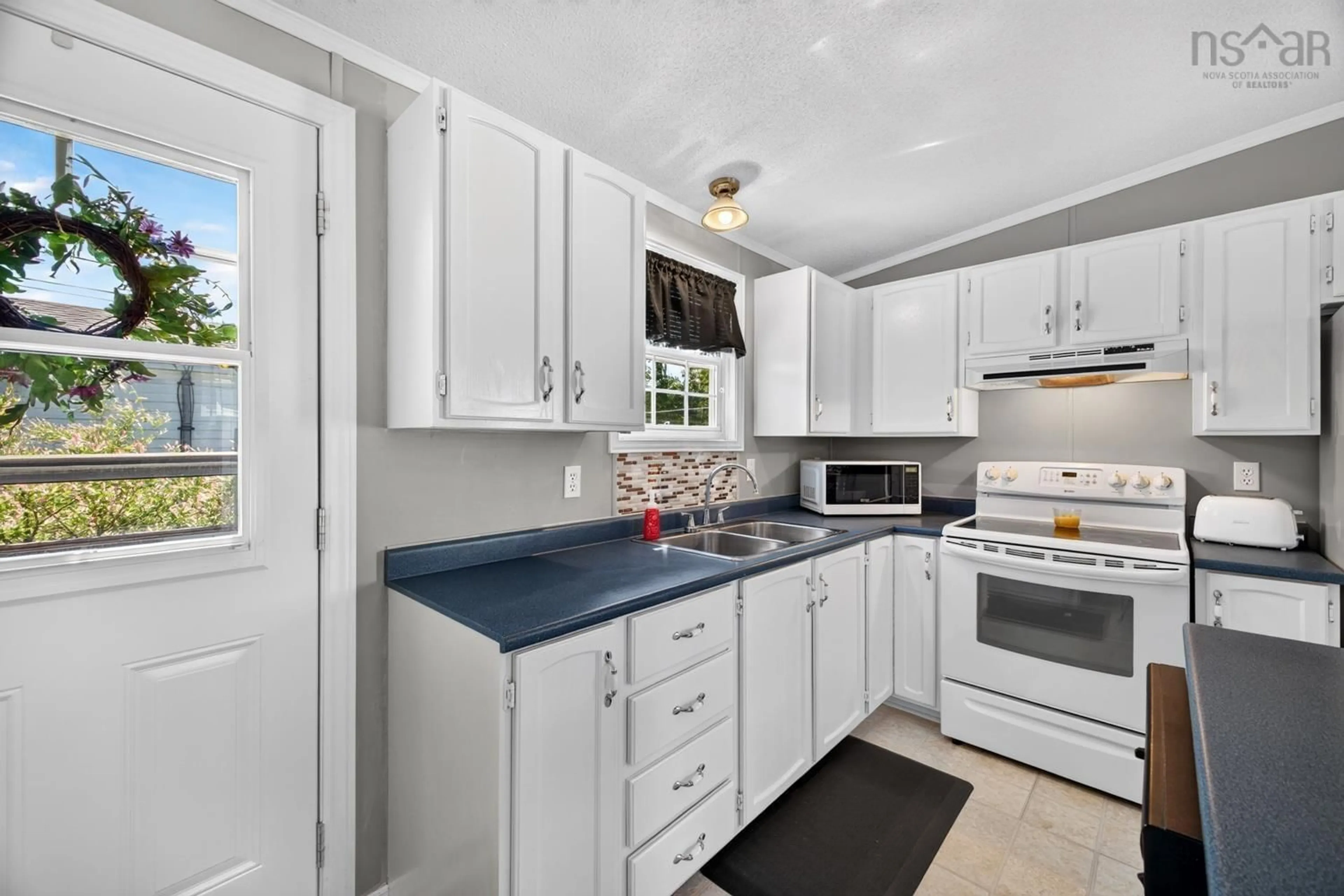 Standard kitchen, ceramic/tile floor for 20 College Crt, Bible Hill Nova Scotia B2N 7G7