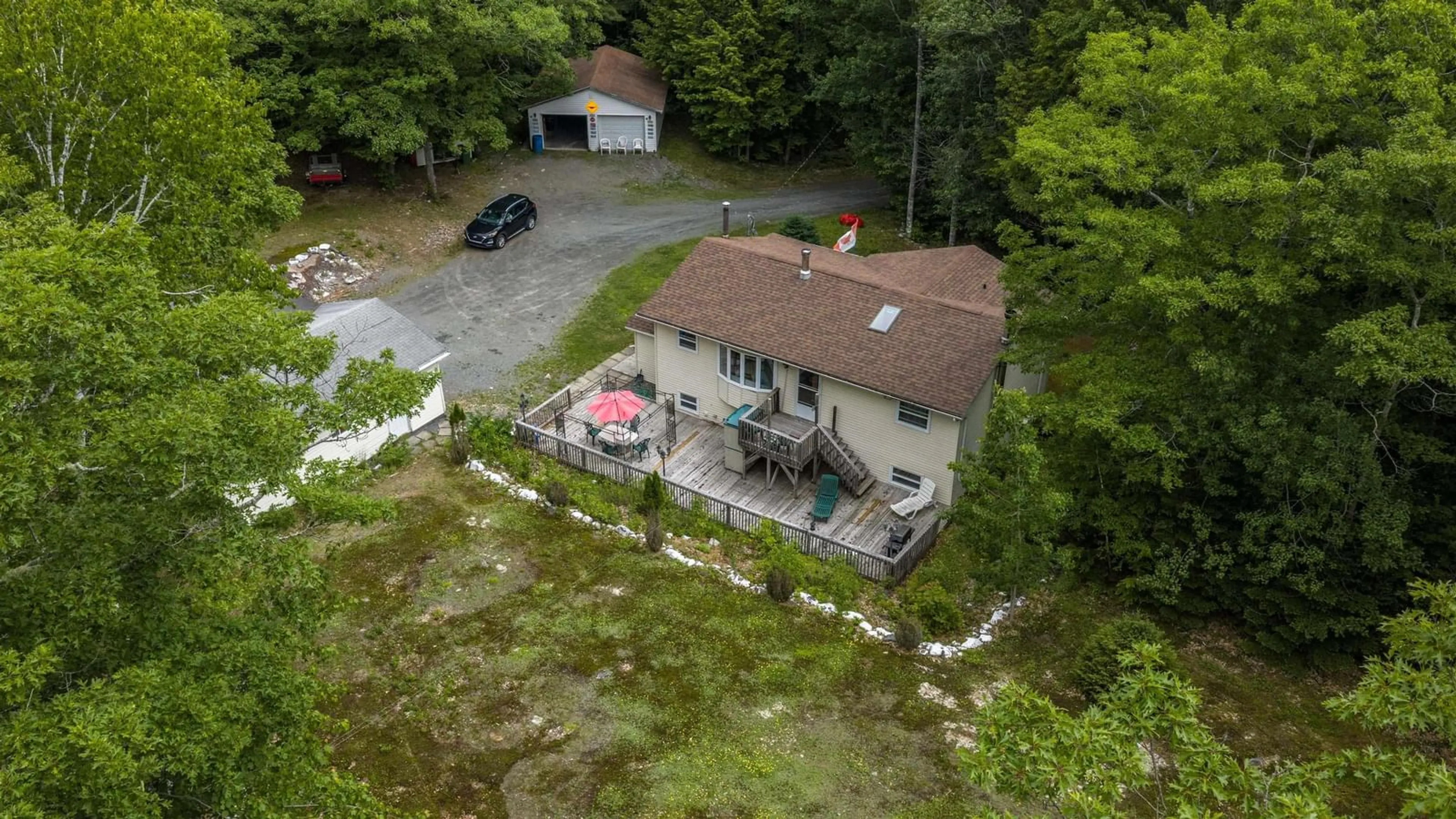 A pic from outside/outdoor area/front of a property/back of a property/a pic from drone, water/lake/river/ocean view for 70 Station Rd, Kinsac Nova Scotia B4G 1C8