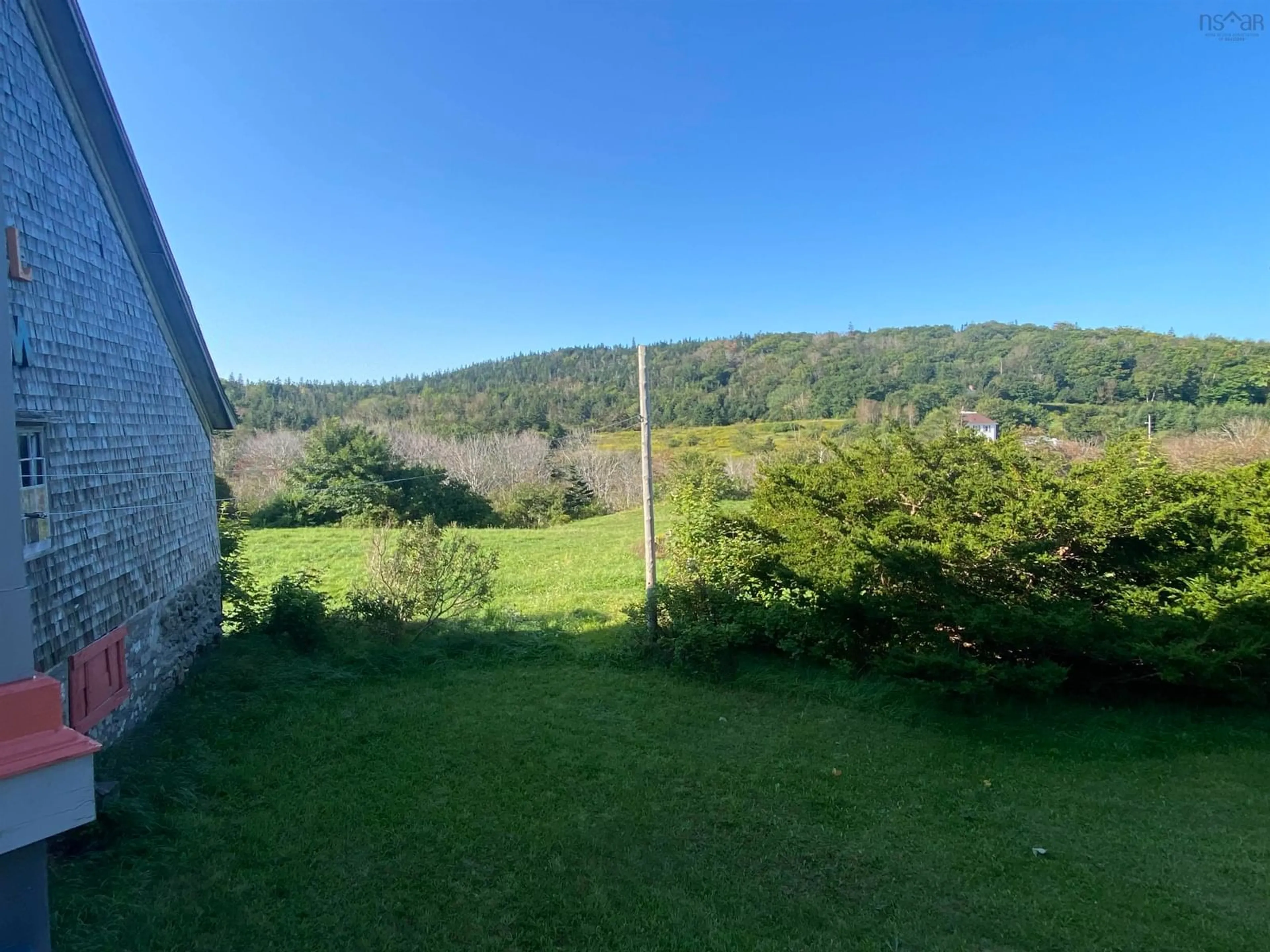 A pic from outside/outdoor area/front of a property/back of a property/a pic from drone, forest/trees view for 219 Trout Cove Rd, Centreville Nova Scotia B0V 1A0