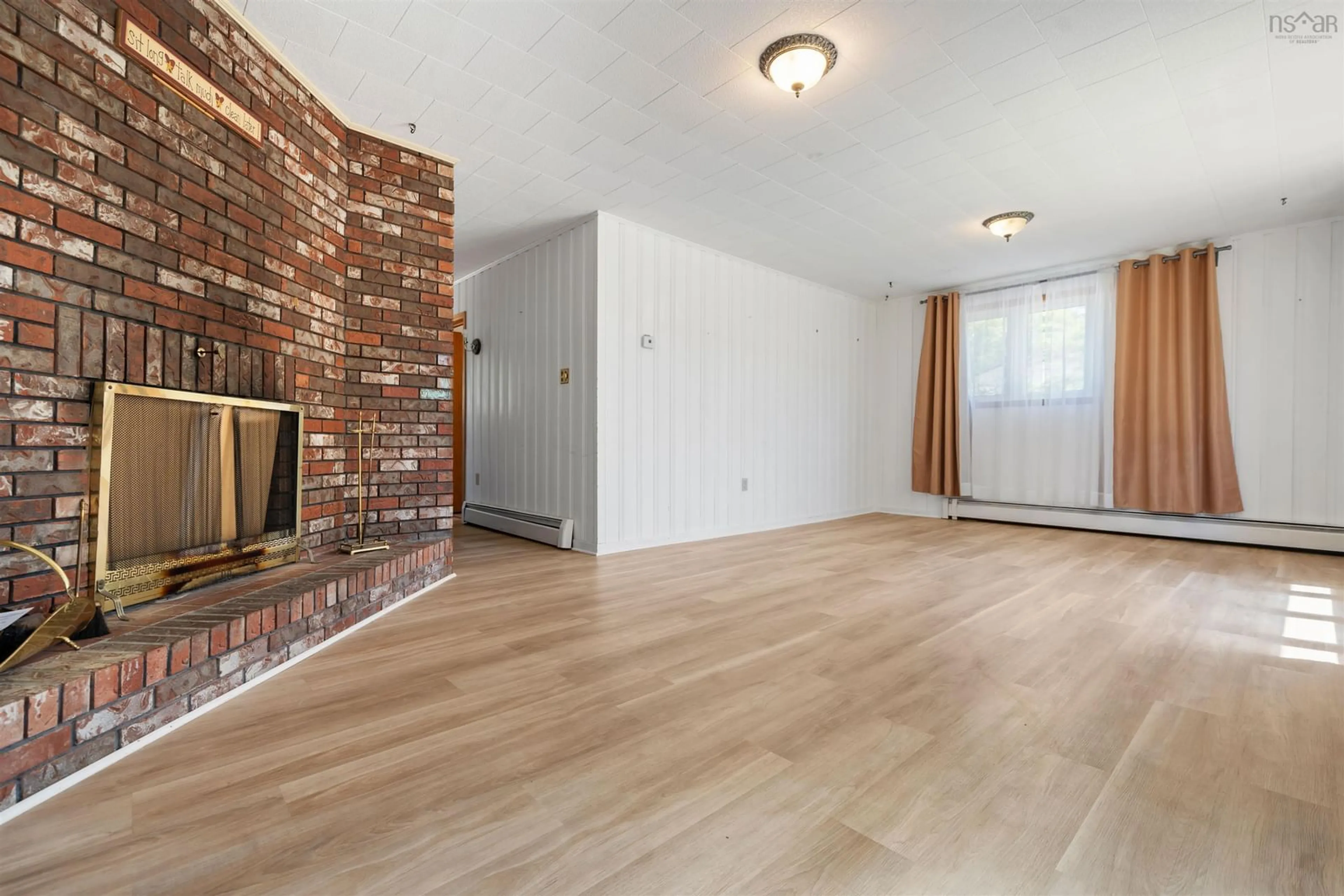 Living room with furniture, wood/laminate floor for 163 York St, New Glasgow Nova Scotia B2H 5L5