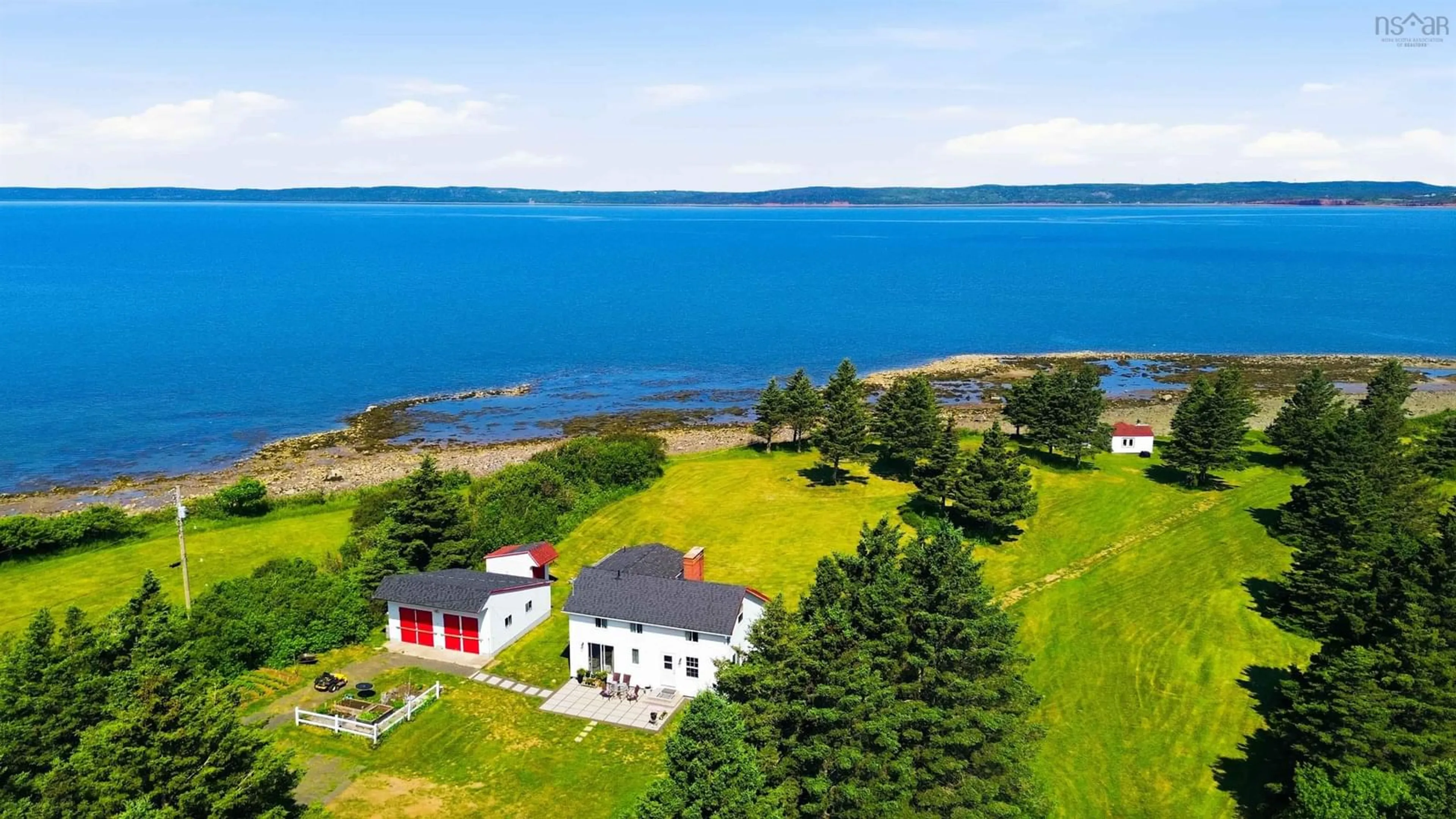 A pic from outside/outdoor area/front of a property/back of a property/a pic from drone, water/lake/river/ocean view for 7939 Highway 101, Barton Nova Scotia B0W 1H0