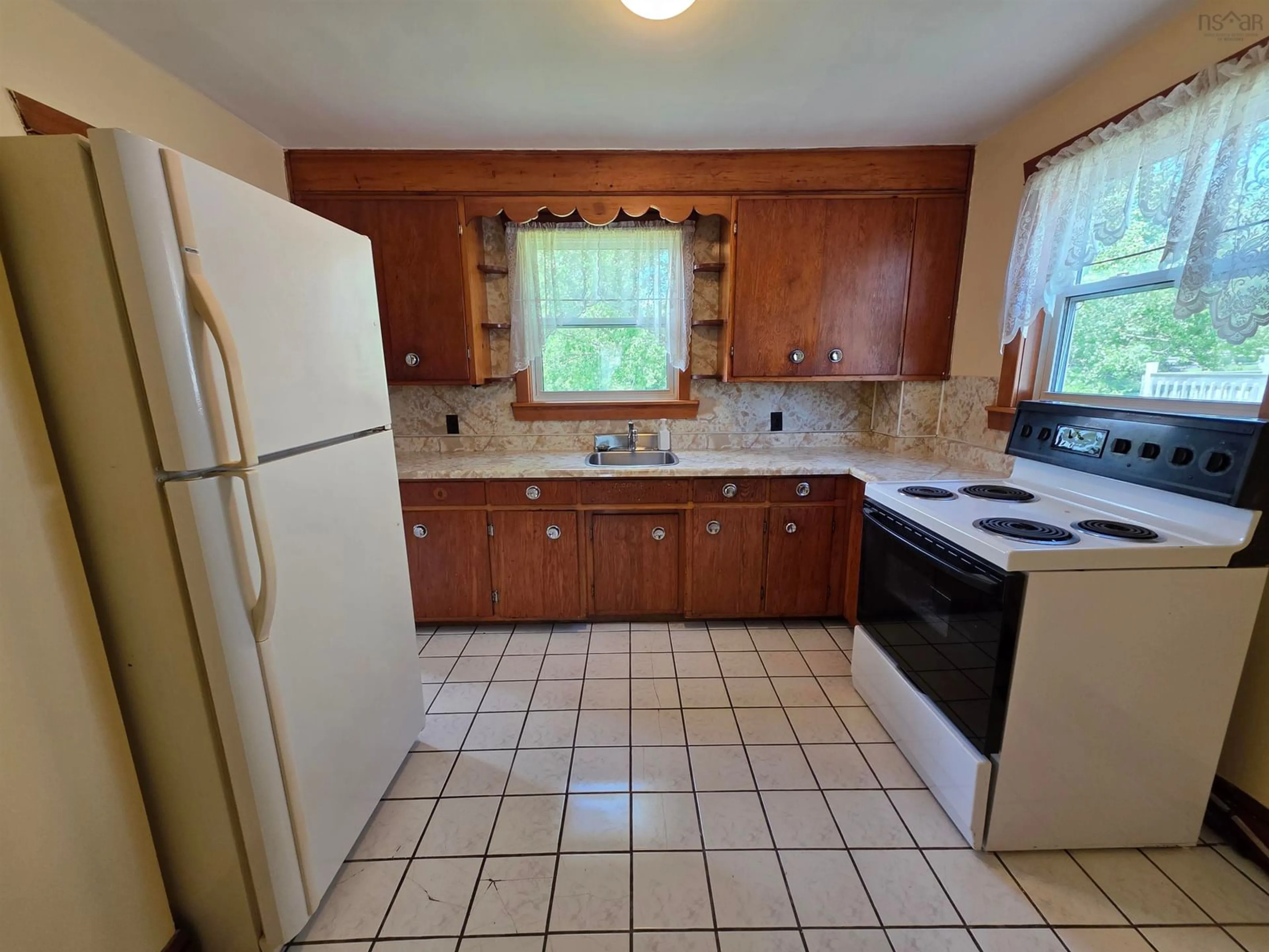 Standard kitchen, ceramic/tile floor for 73 Taylor St, Sydney Nova Scotia B1N 2W5