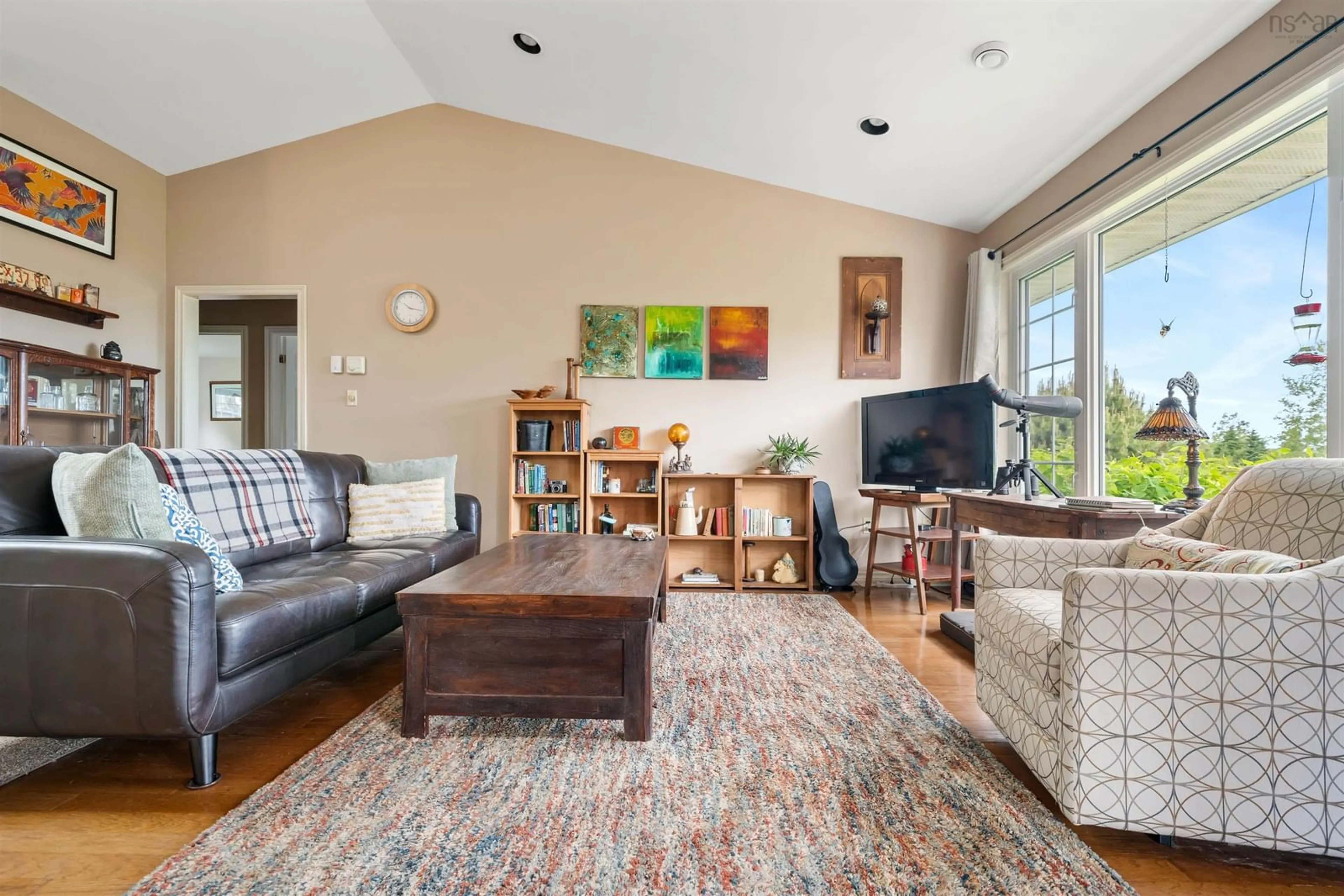 Living room with furniture, wood/laminate floor for 39 Arrow Head Cres, Waterside Nova Scotia B0K 1H0