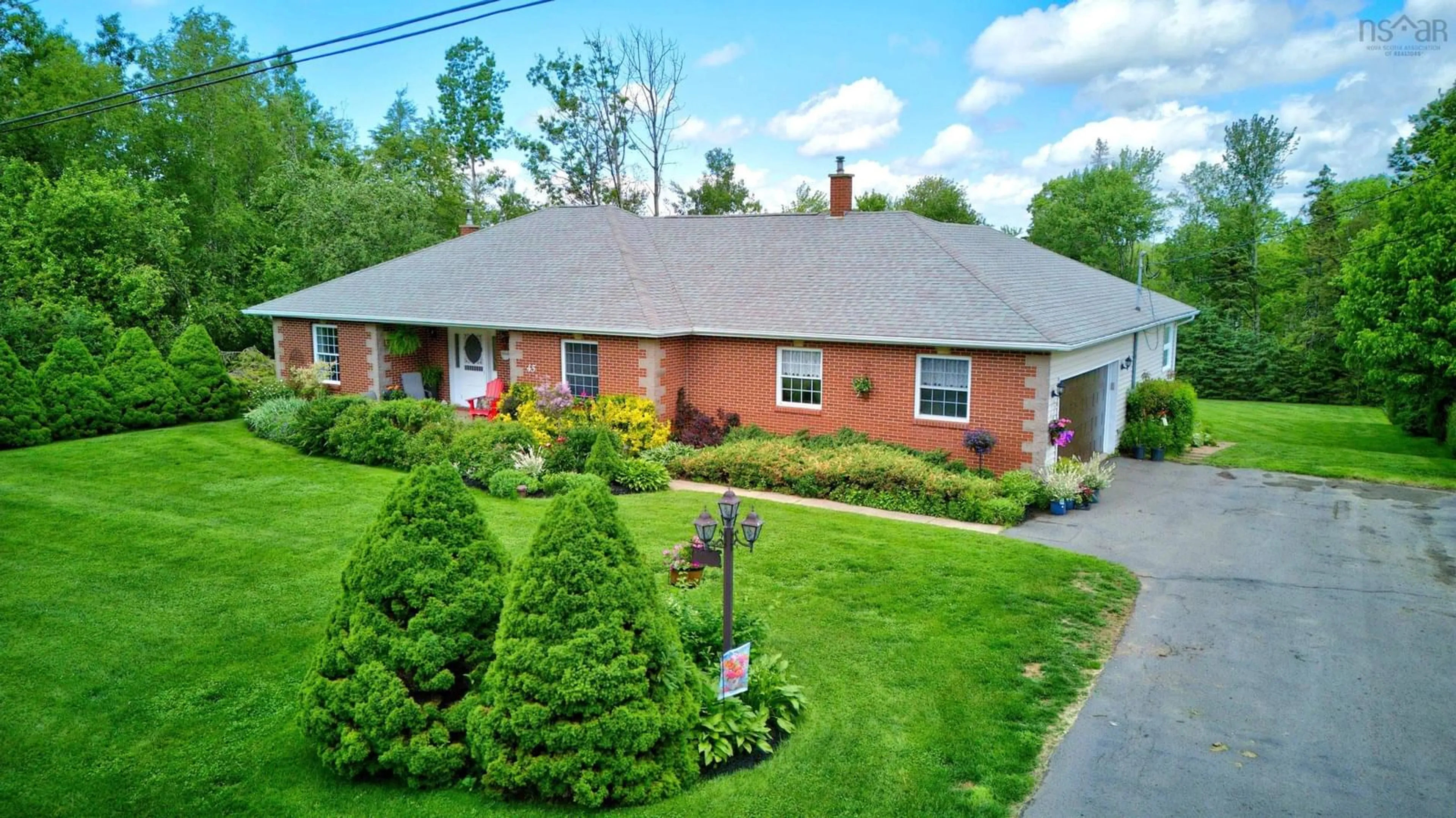 A pic from outside/outdoor area/front of a property/back of a property/a pic from drone, street for 45 Glenabbey Dr, Murray Siding Nova Scotia B6L 3L1