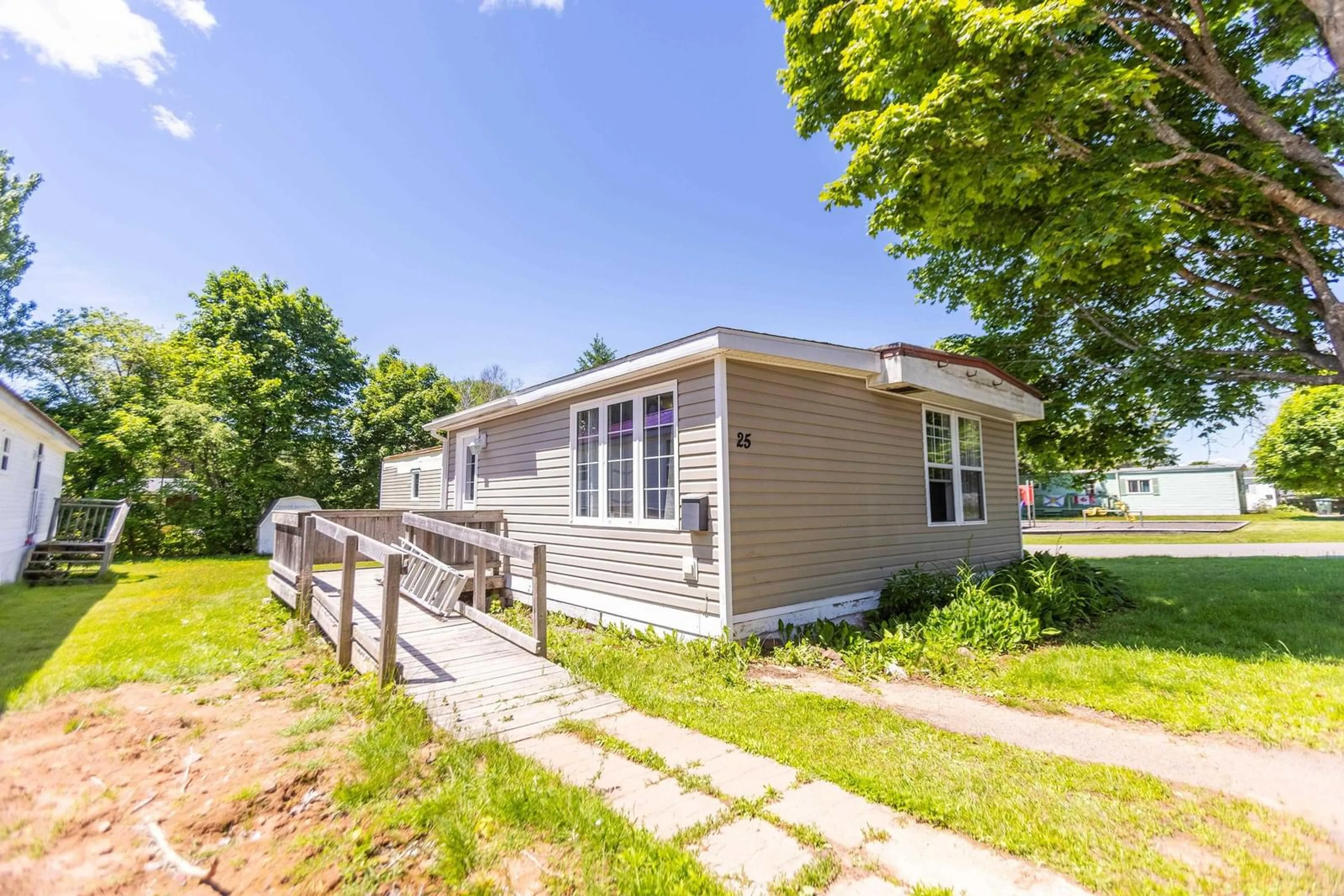 Home with vinyl exterior material, street for 25 Liberty Lane, Amherst Nova Scotia B4H 2K5