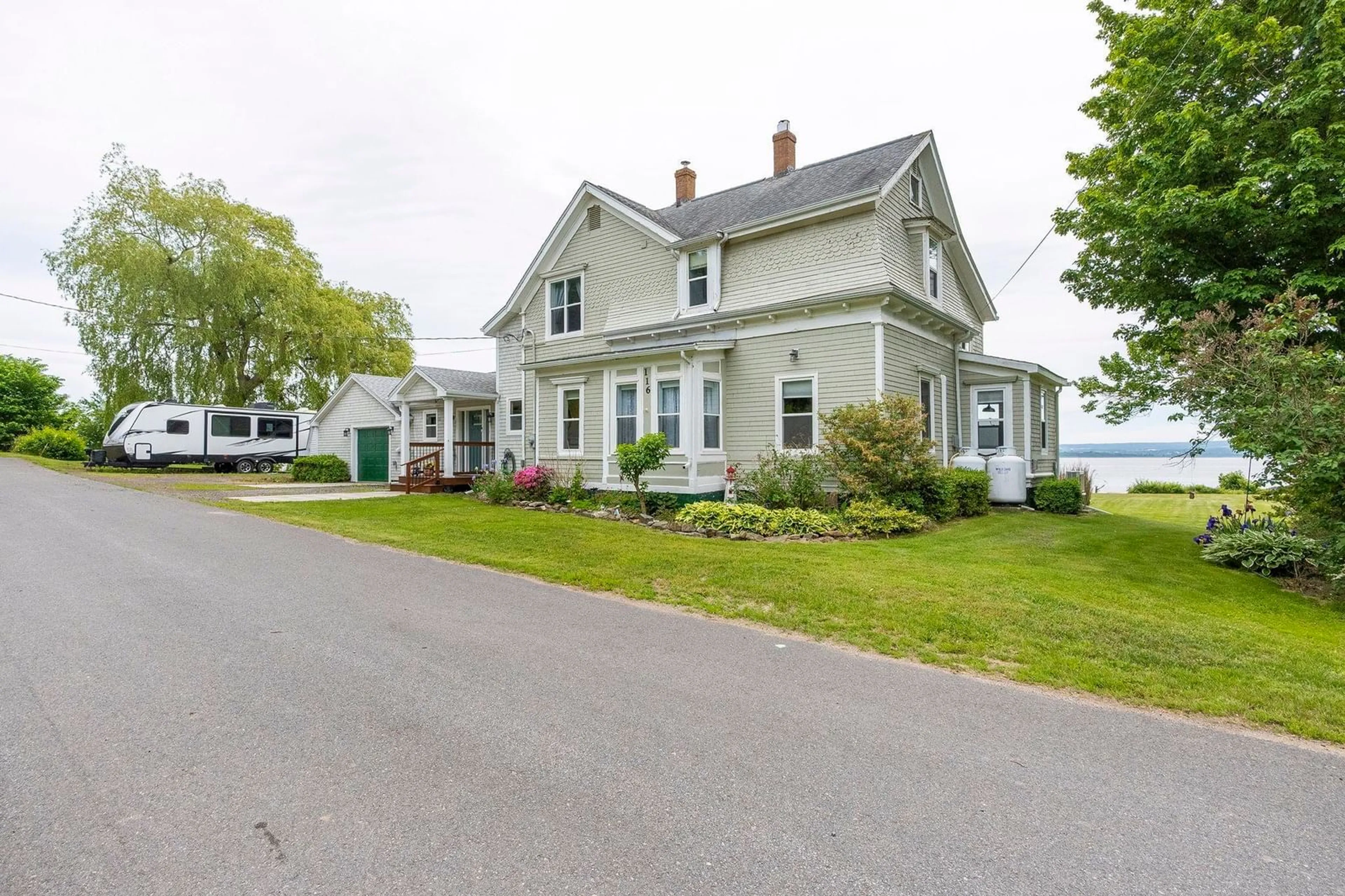 A pic from outside/outdoor area/front of a property/back of a property/a pic from drone, street for 116 Pleasant St, Kingsport Nova Scotia B0P 1H0