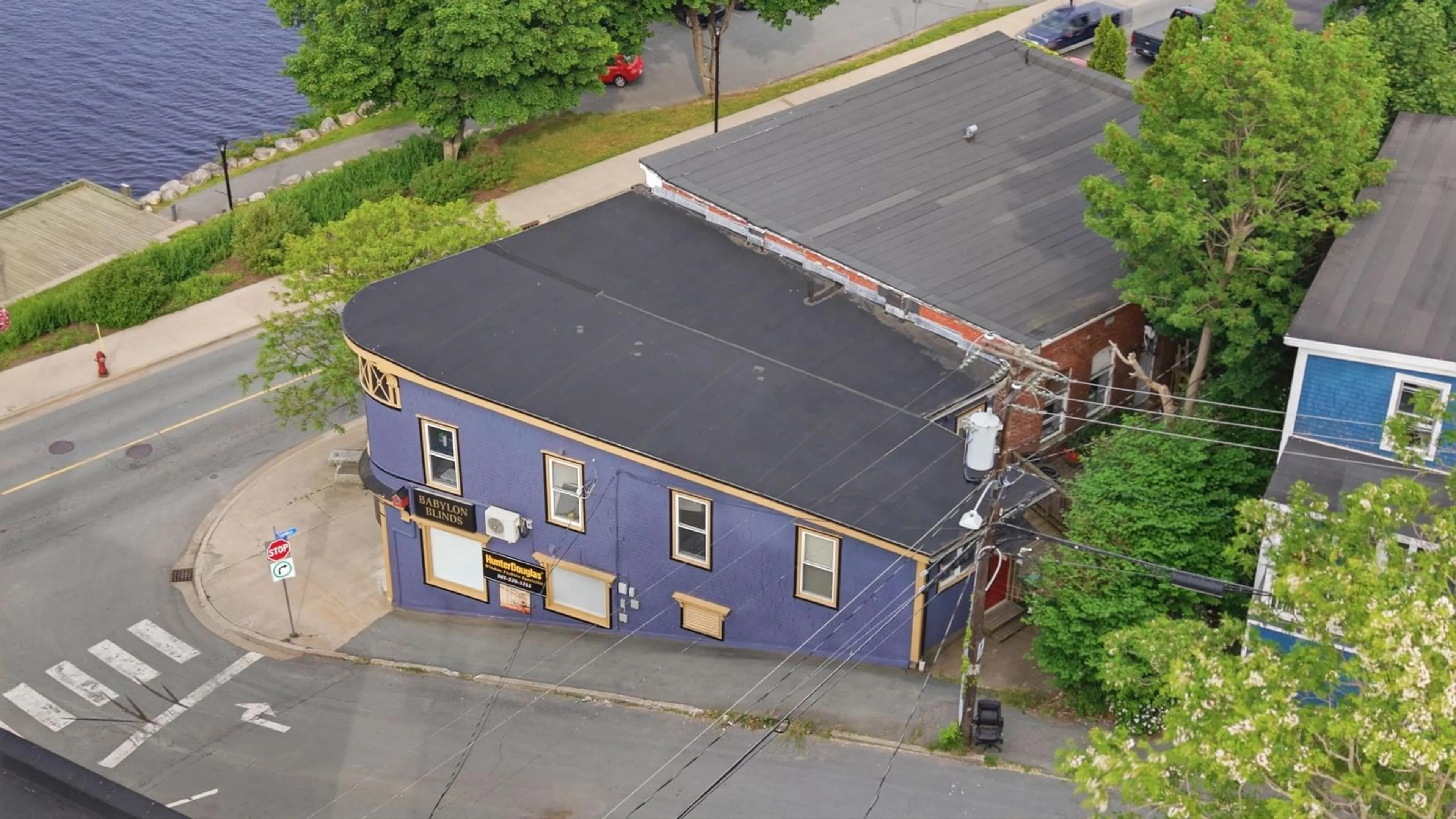 A pic from outside/outdoor area/front of a property/back of a property/a pic from drone, building for 481 & 483 King St, Bridgewater Nova Scotia B4V 1B2