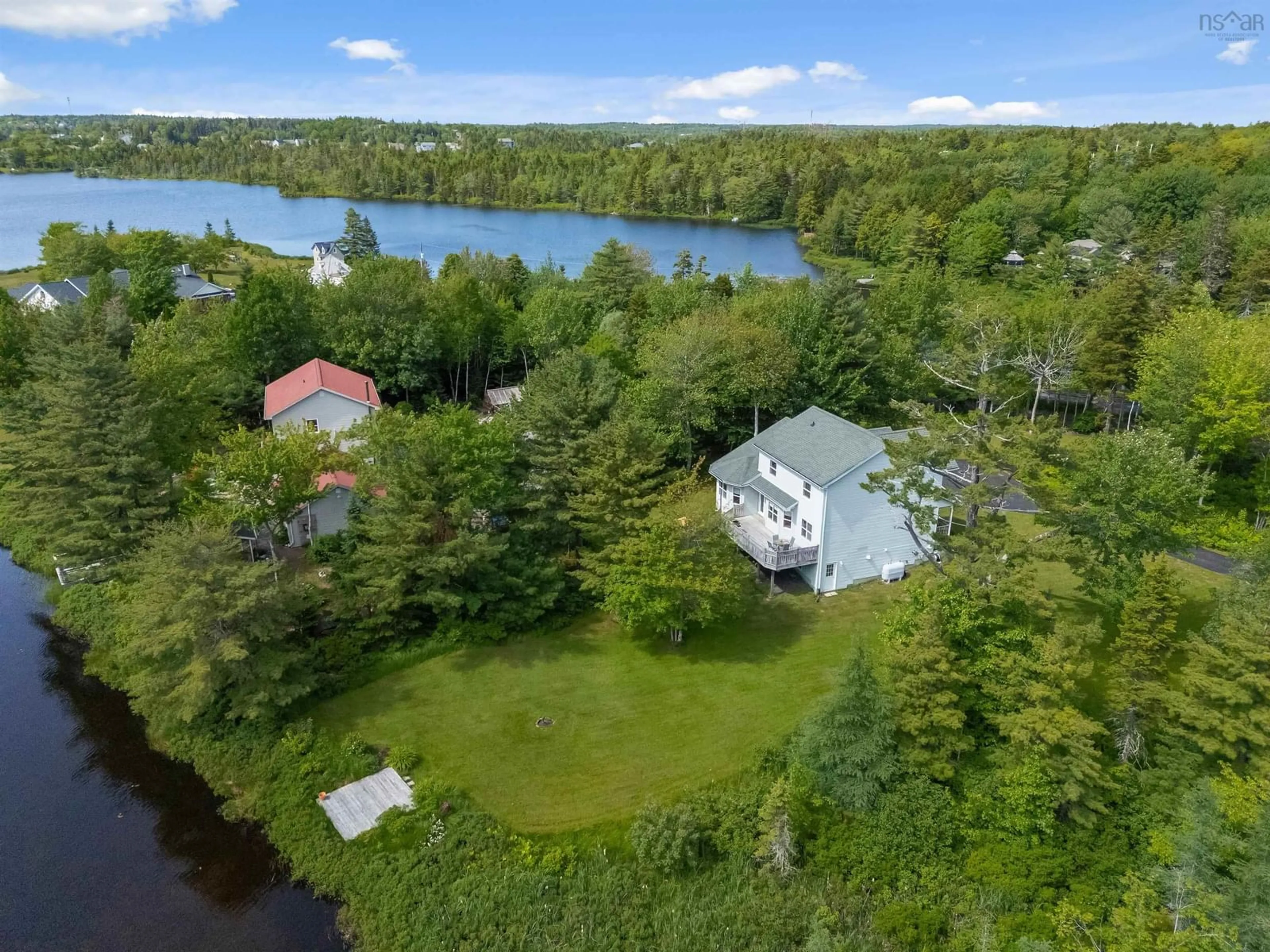 A pic from outside/outdoor area/front of a property/back of a property/a pic from drone, water/lake/river/ocean view for 111 St George Blvd, Hammonds Plains Nova Scotia B4B 1K7